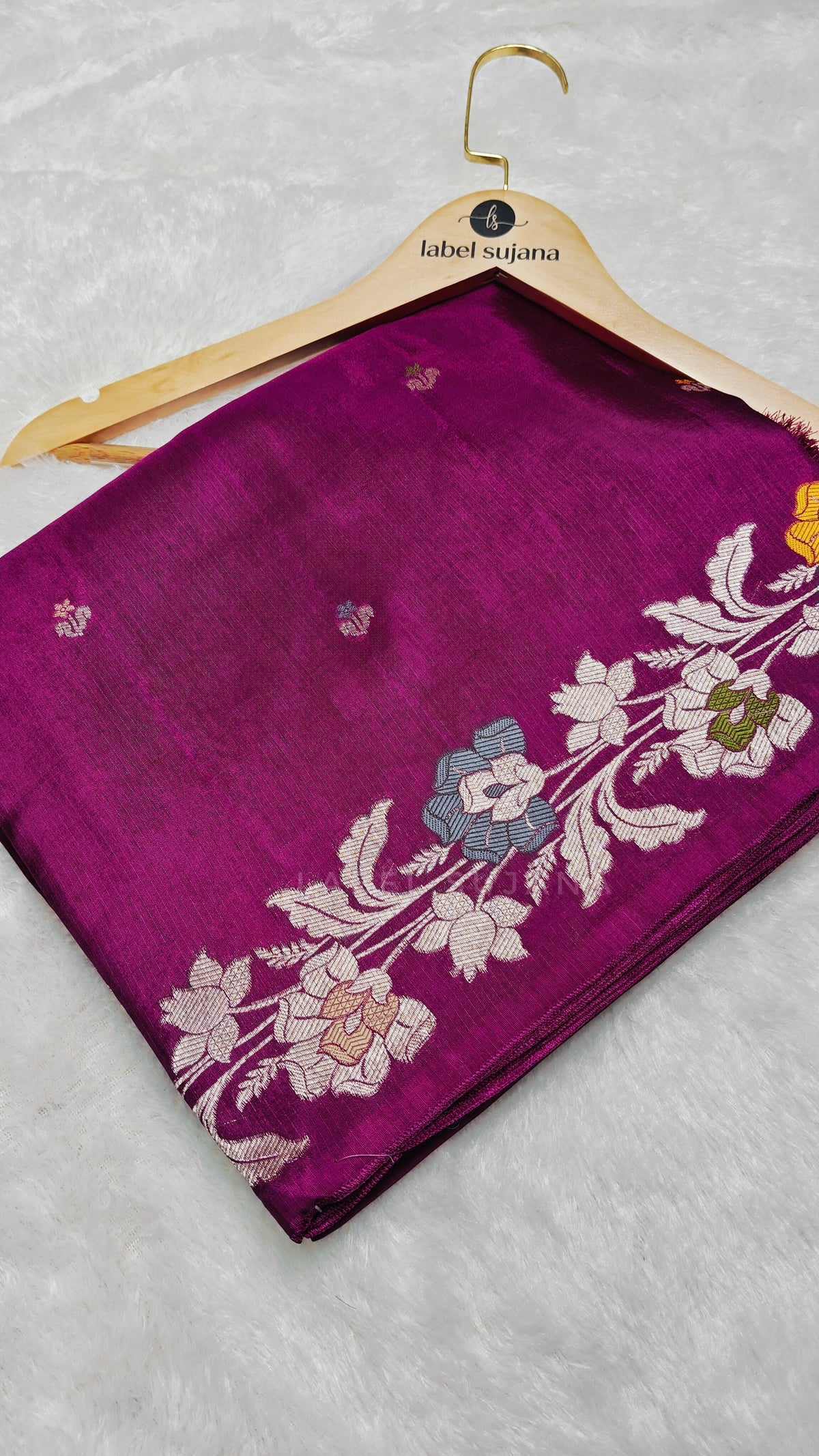 A magenta silk saree