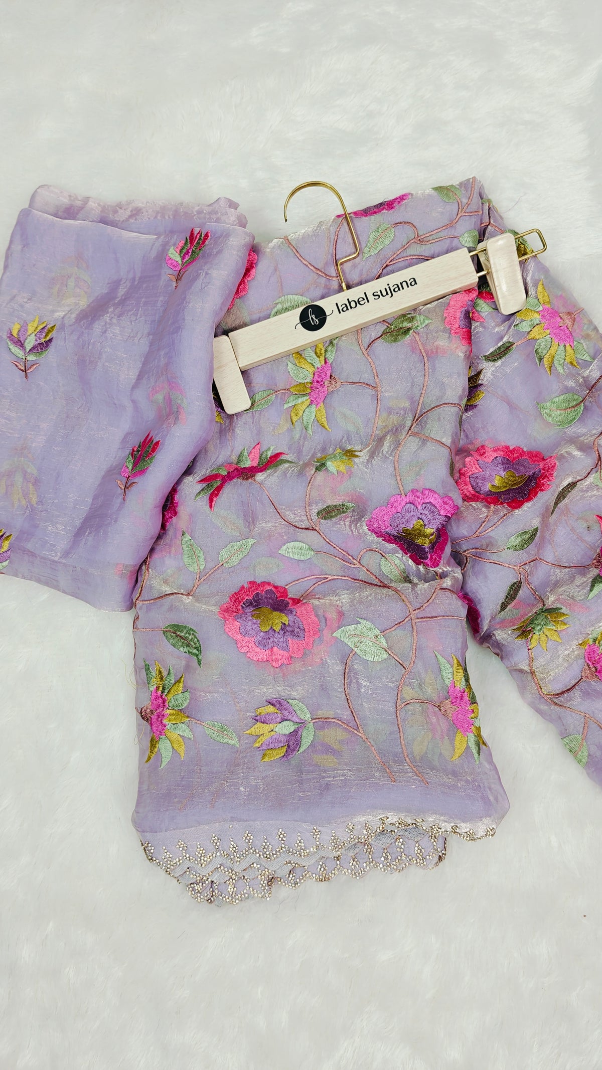 A Lavender embroidery saree with matching blouse 