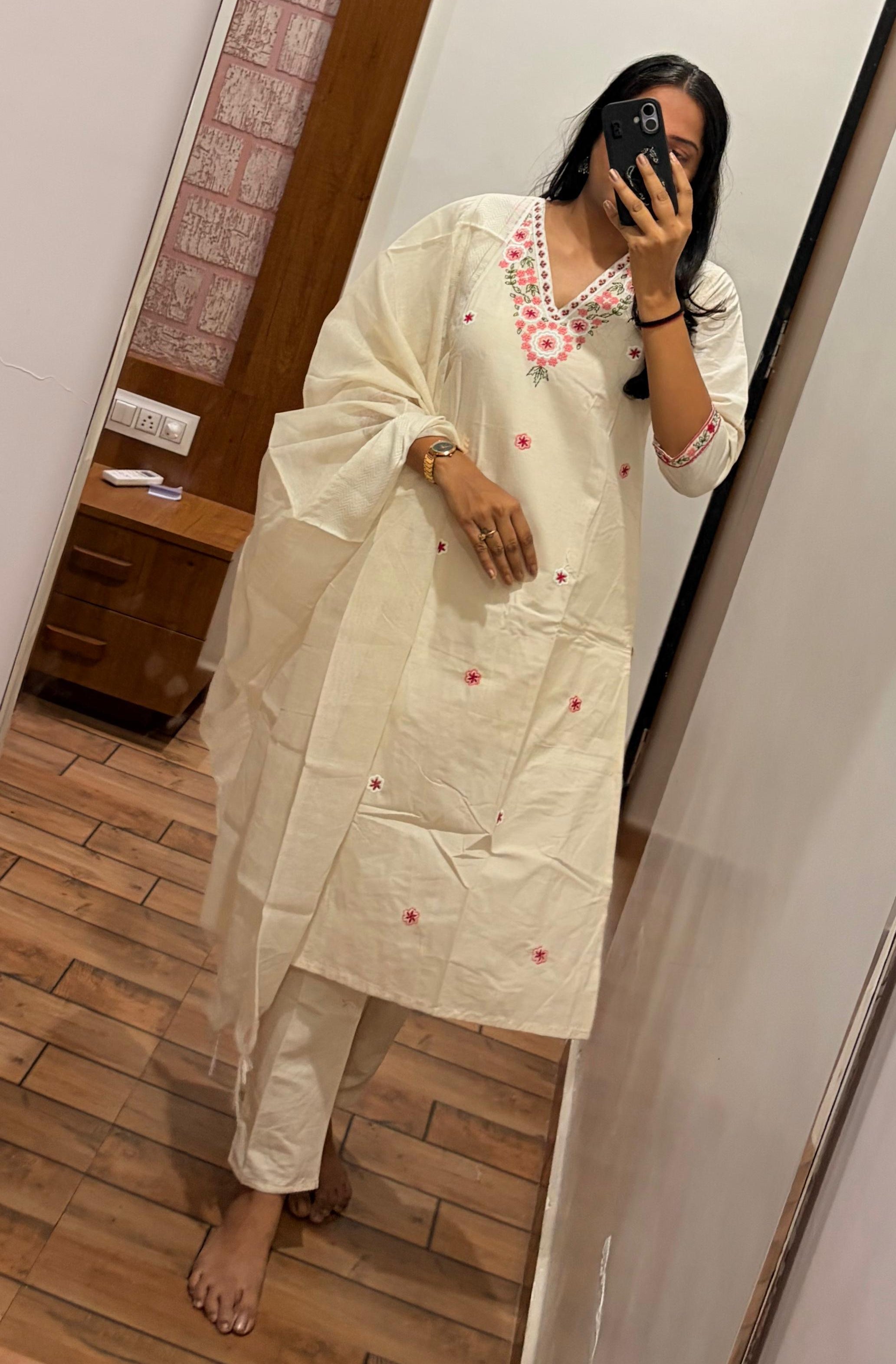 White dress with embroidery work 