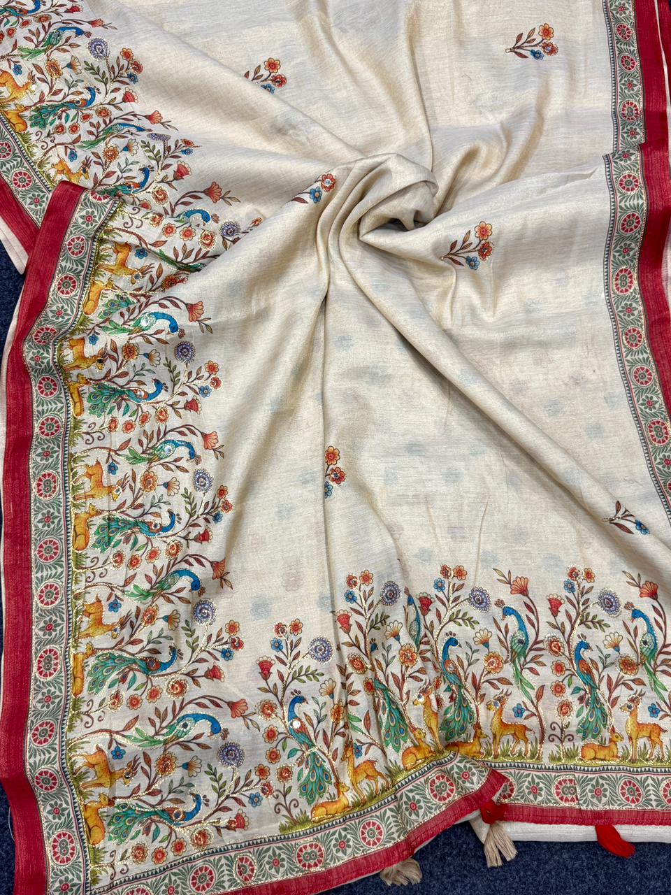 Cream Decorative fabric with intricate patterns and colors on a background