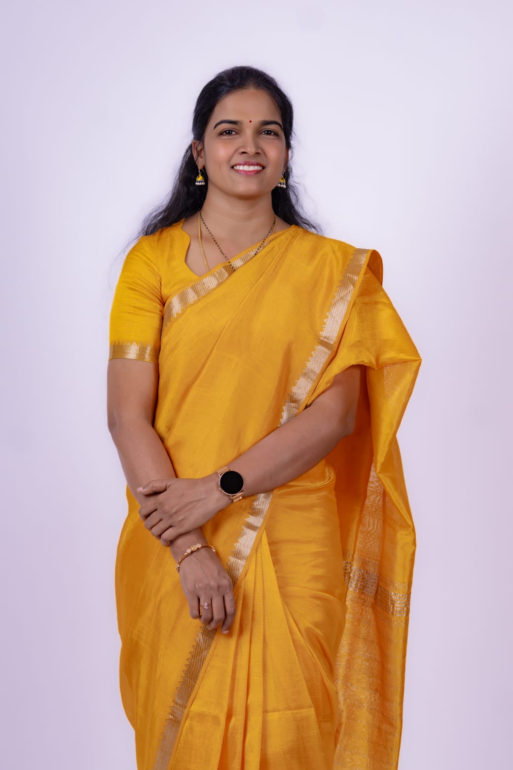 A yellow Mangalagiri Handloom pattu saree