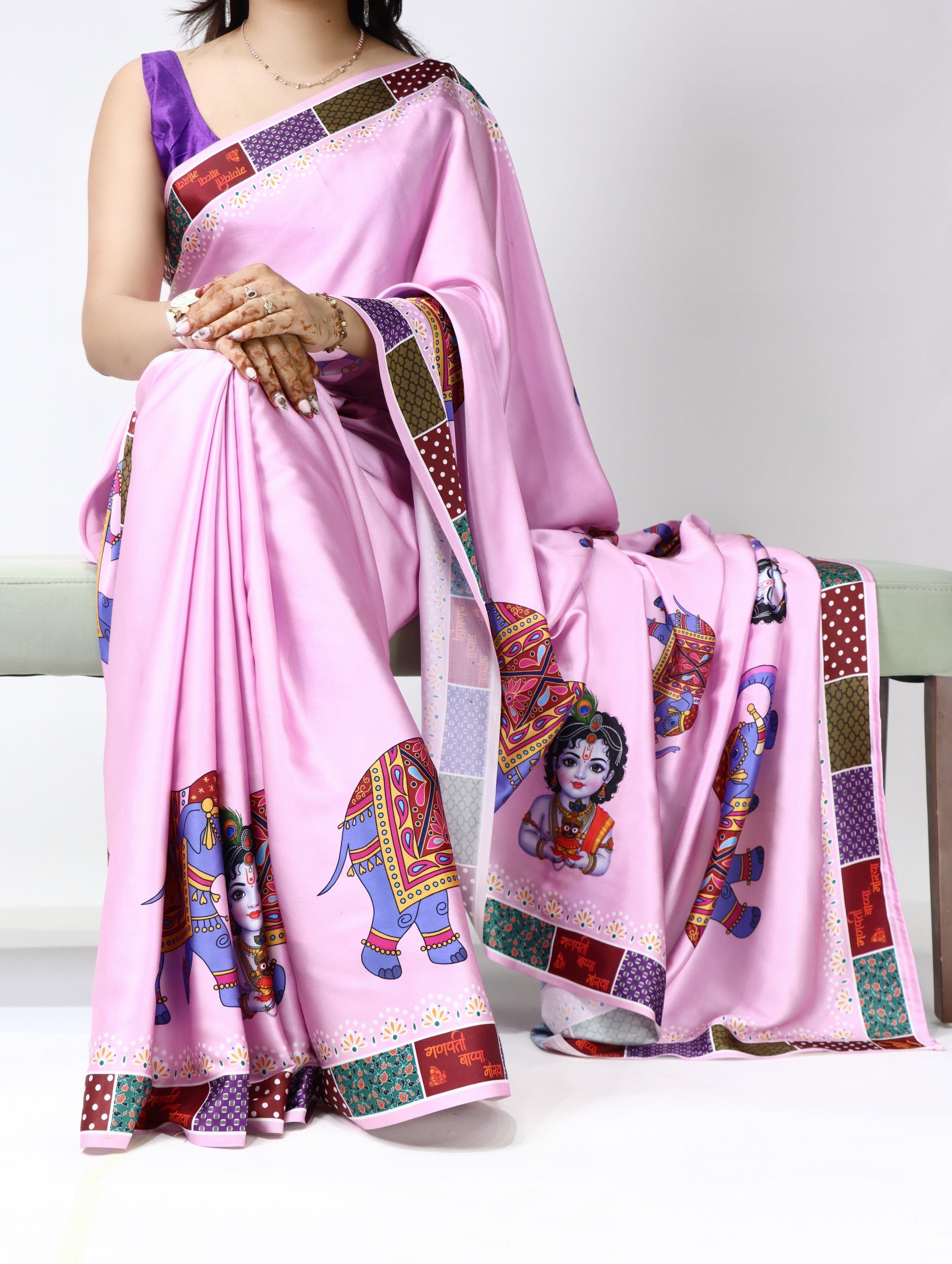 Baby Pink saree with colorful patterns on a white background