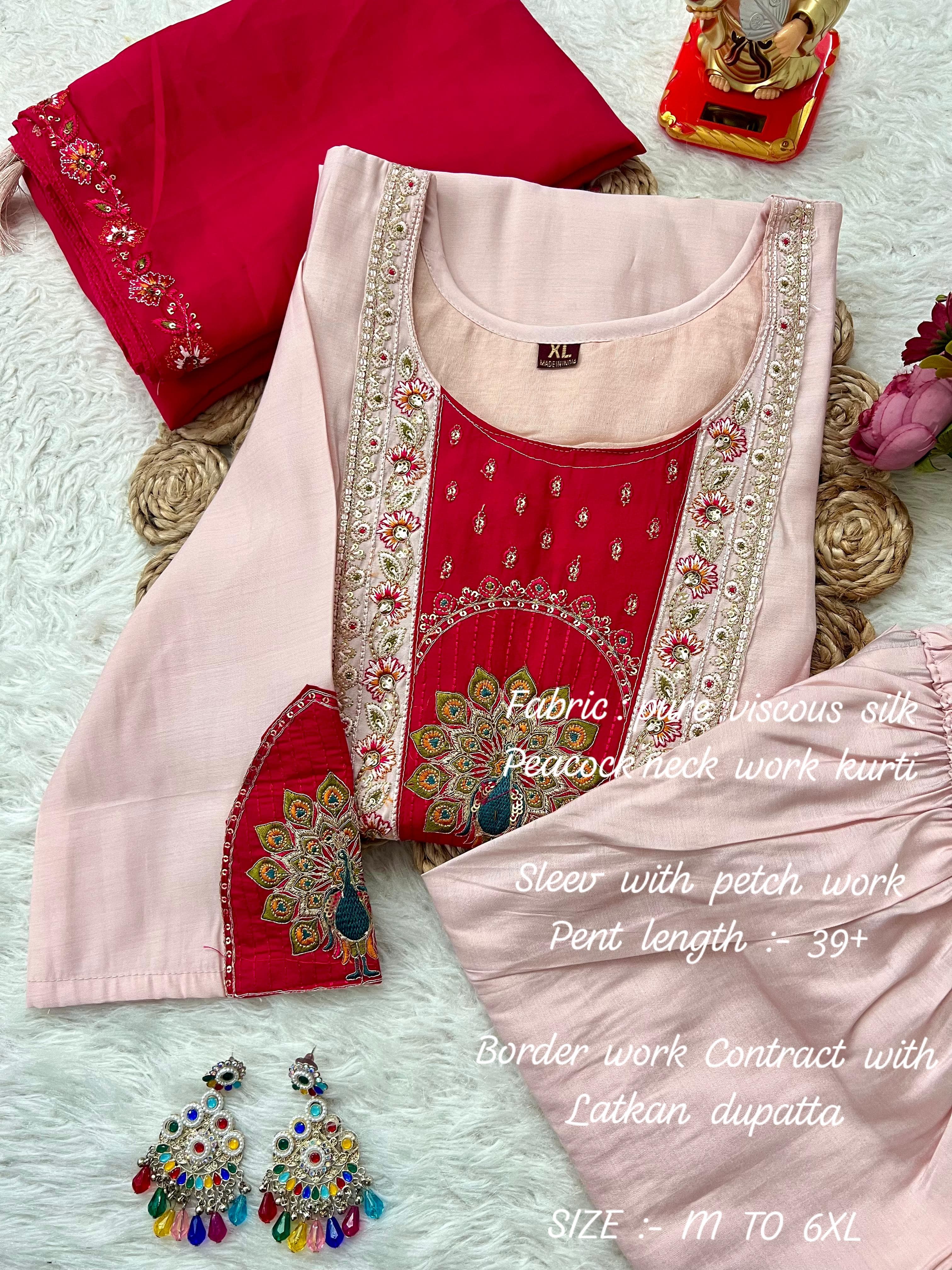 pink embroidery kurti with matching dupatta on a white surface.