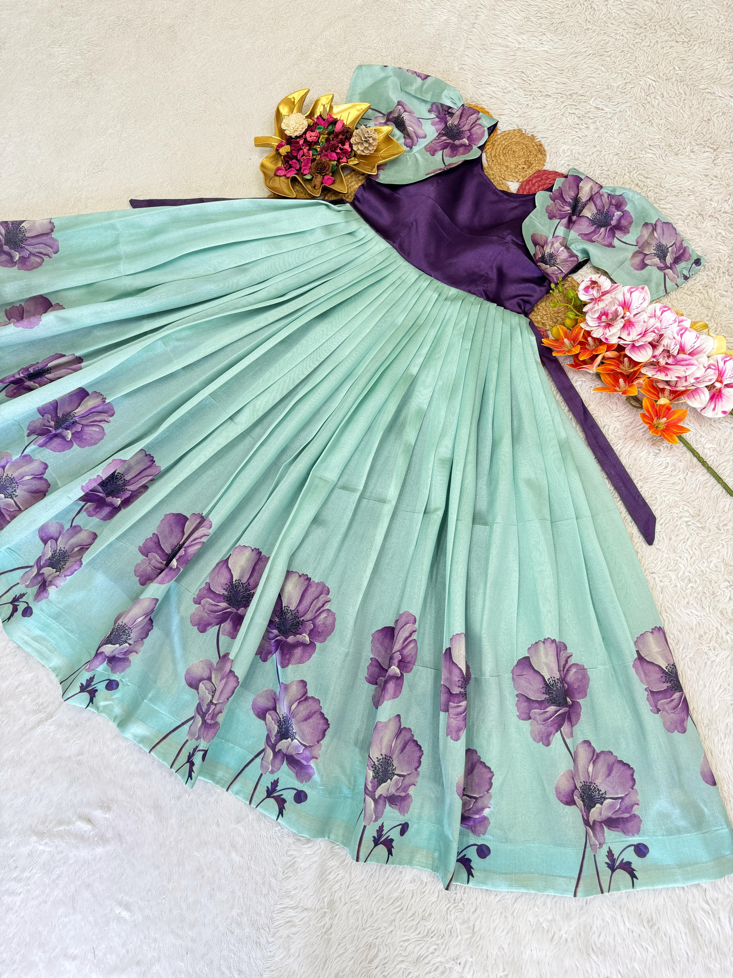 Sky blue frock with purple floral patterns 