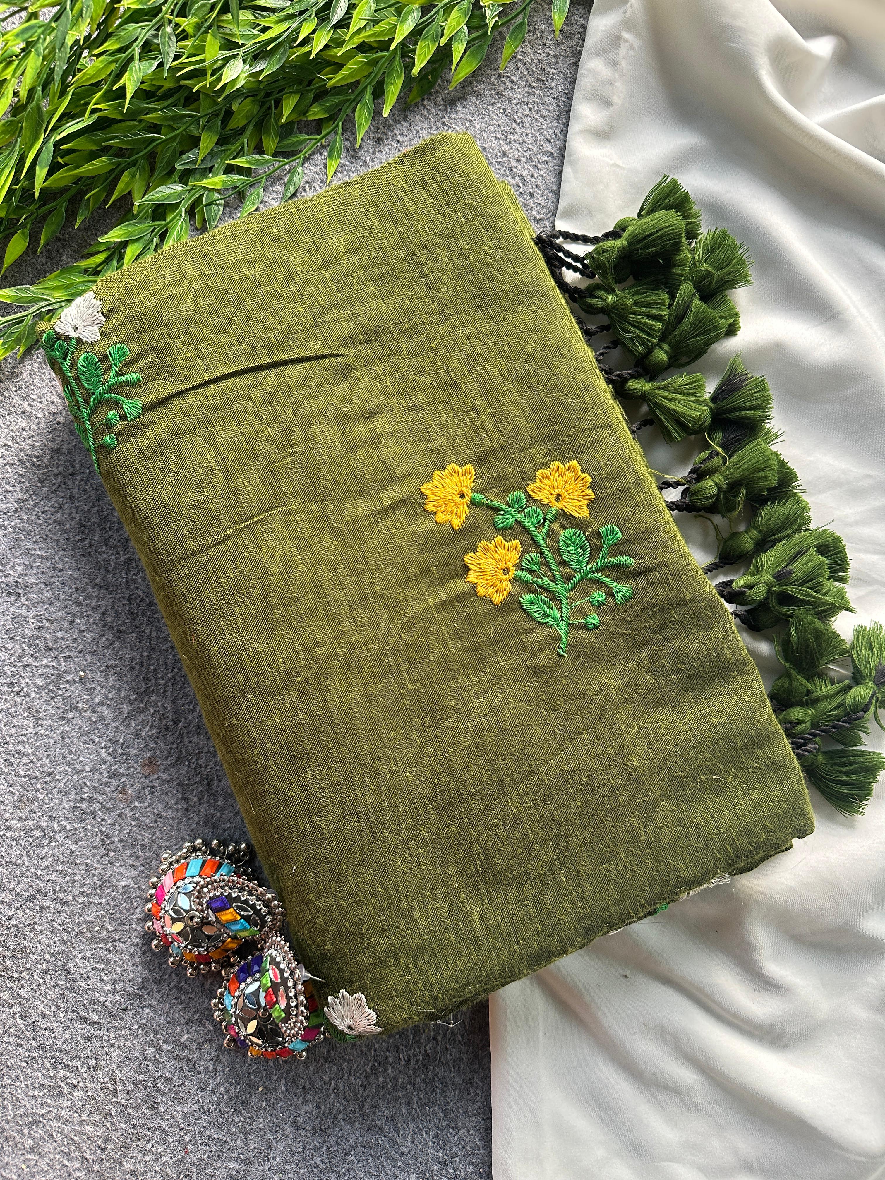 Olive Green fabric with floral embroidery patterns 
