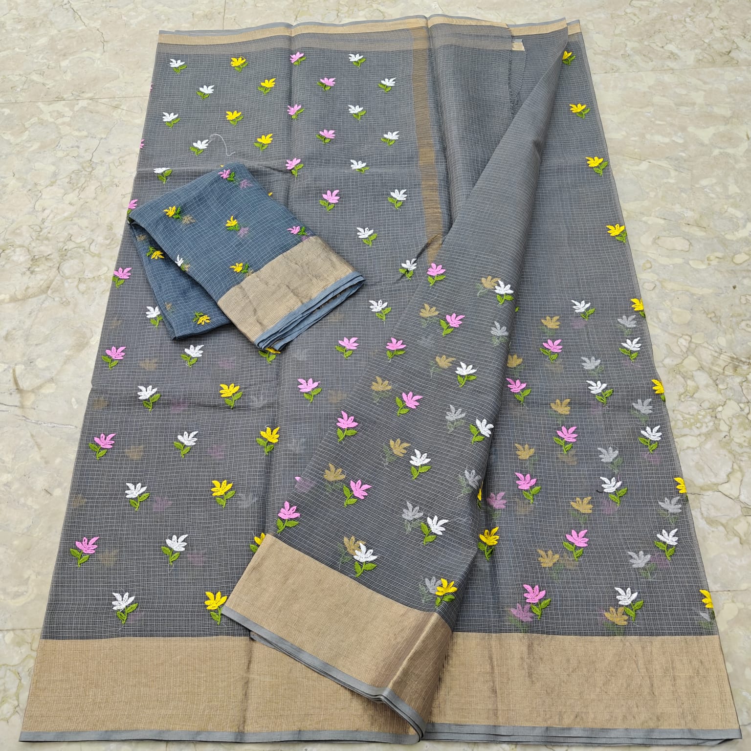 Gray saree with floral patterns 