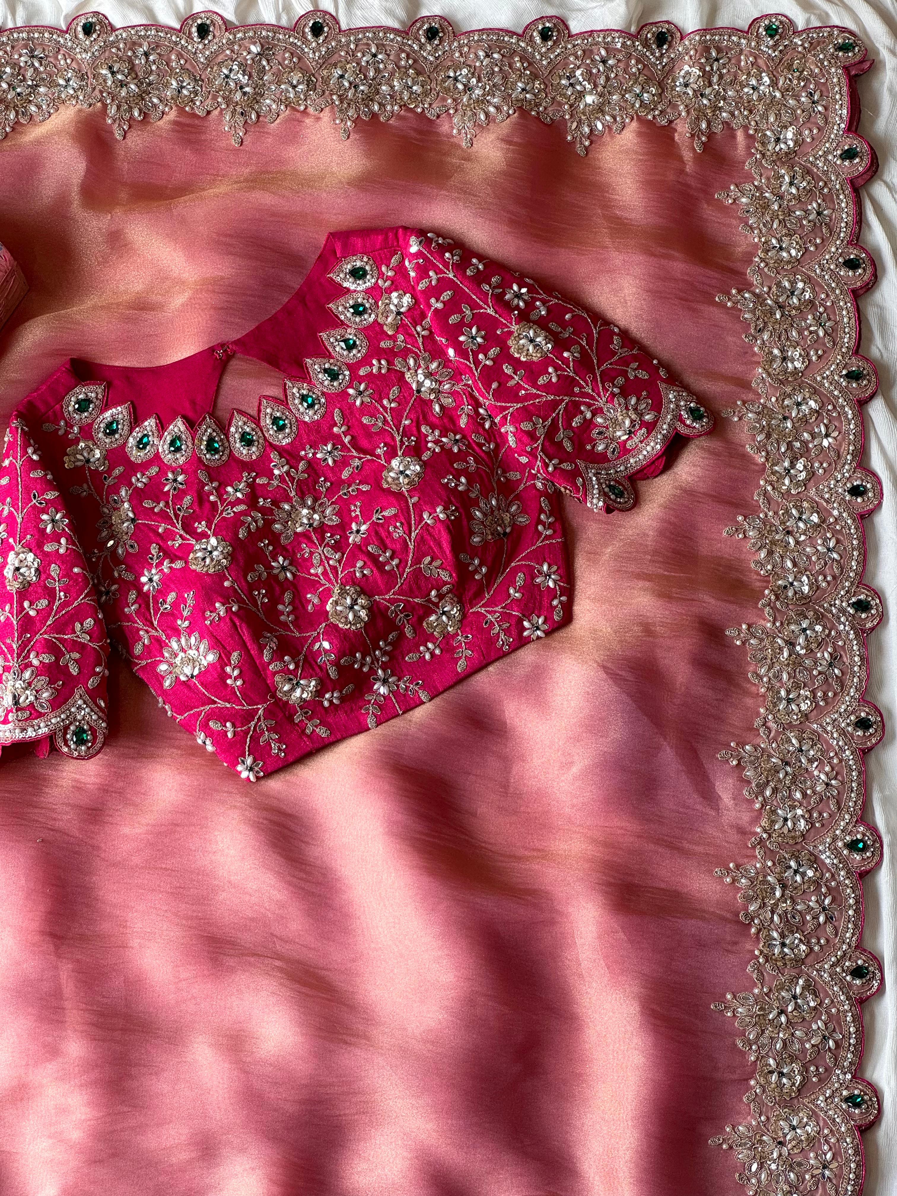 Onion Pink embroidered fabric with intricate patterns and embellishments on a white background