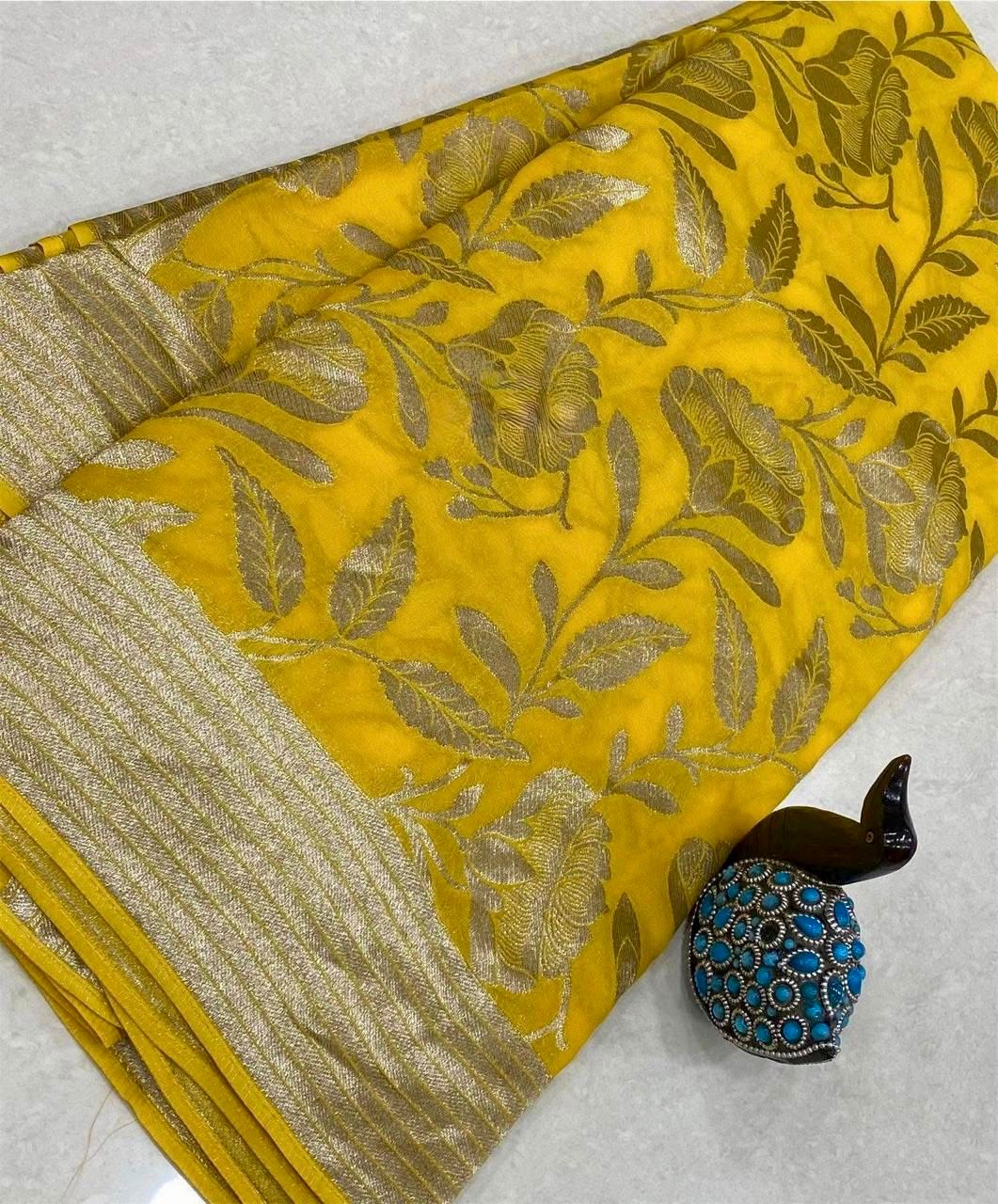 Yellow fabric with floral patterns on a light gray surface