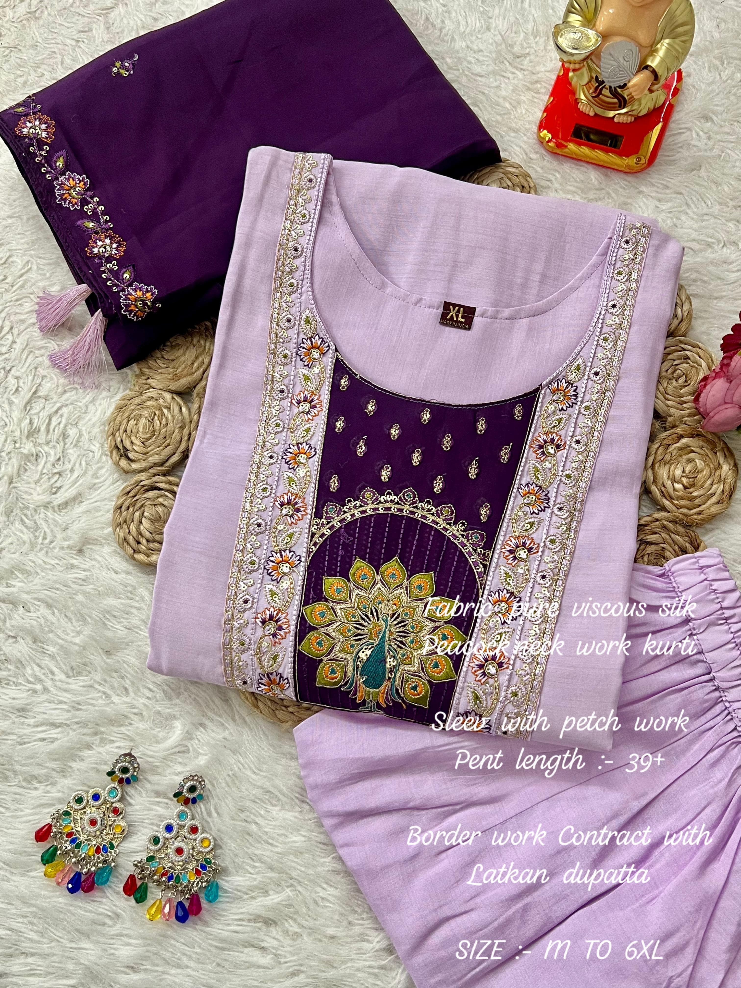  lavender fabric with embroidery, earrings, and decorative items on a texture surface.