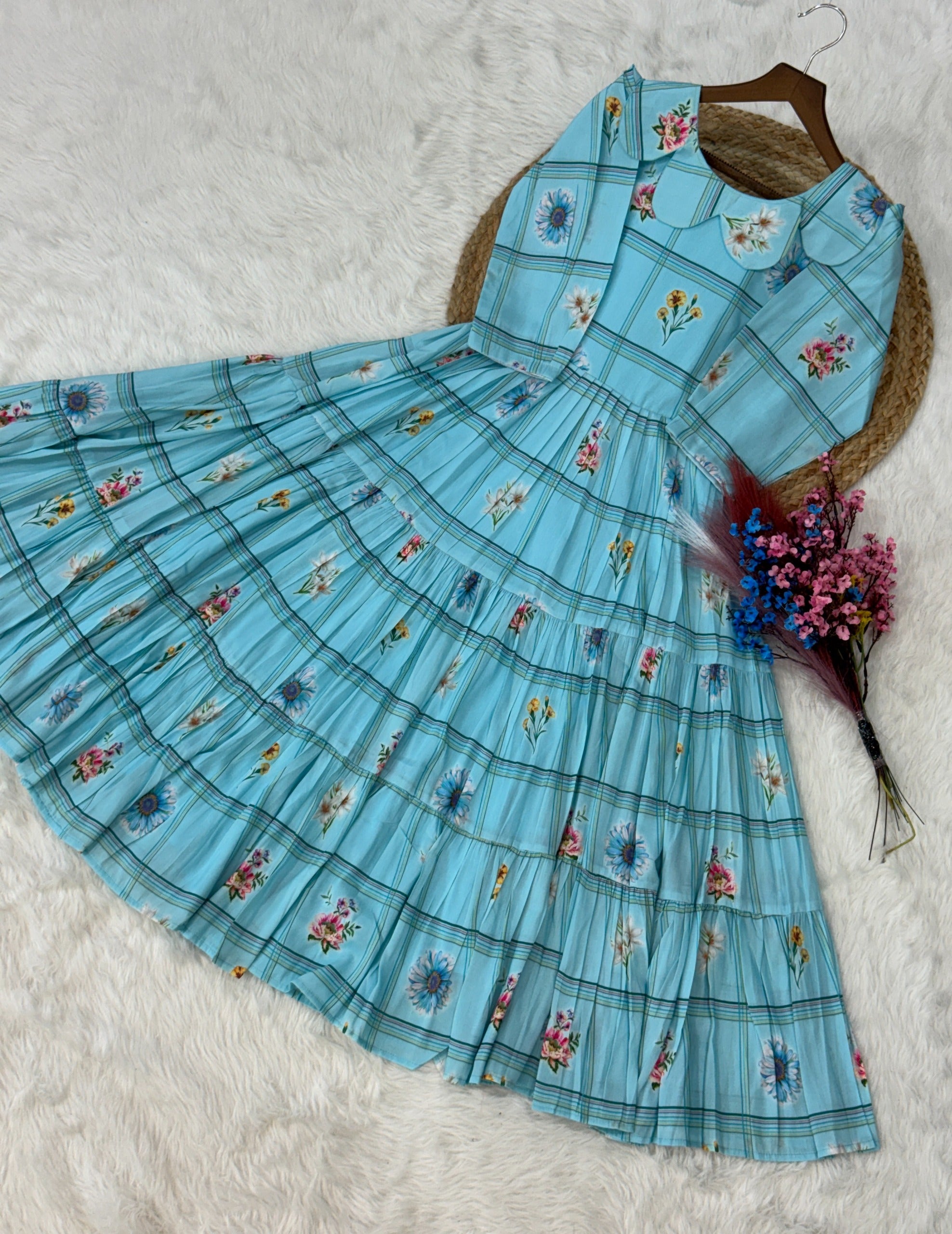 Sky blue frock with floral patterns 