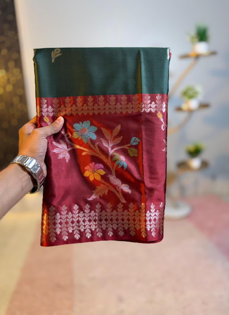 Dark green and red embroidered fabric with floral patterns.