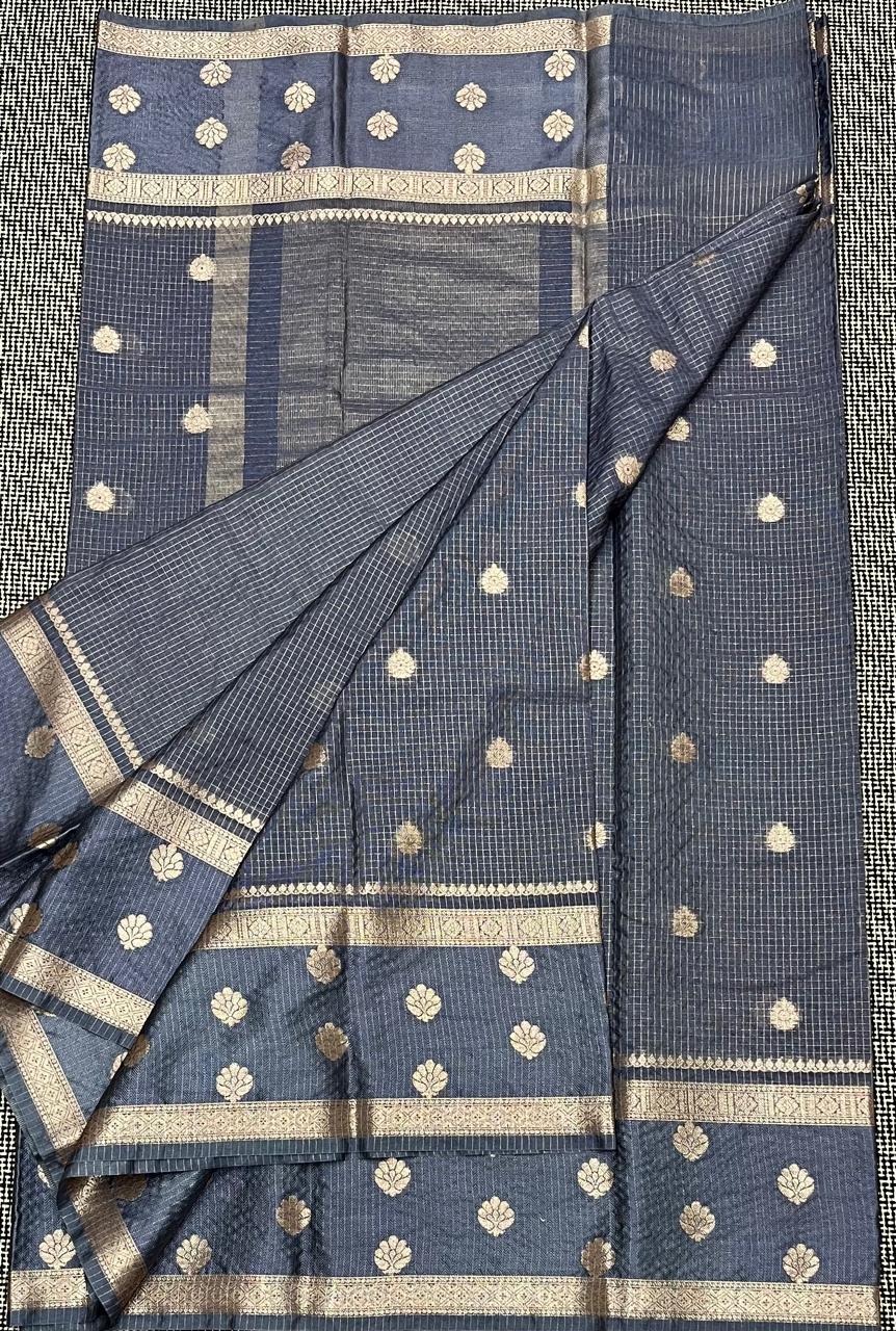 Gray saree with white floral patterns and border