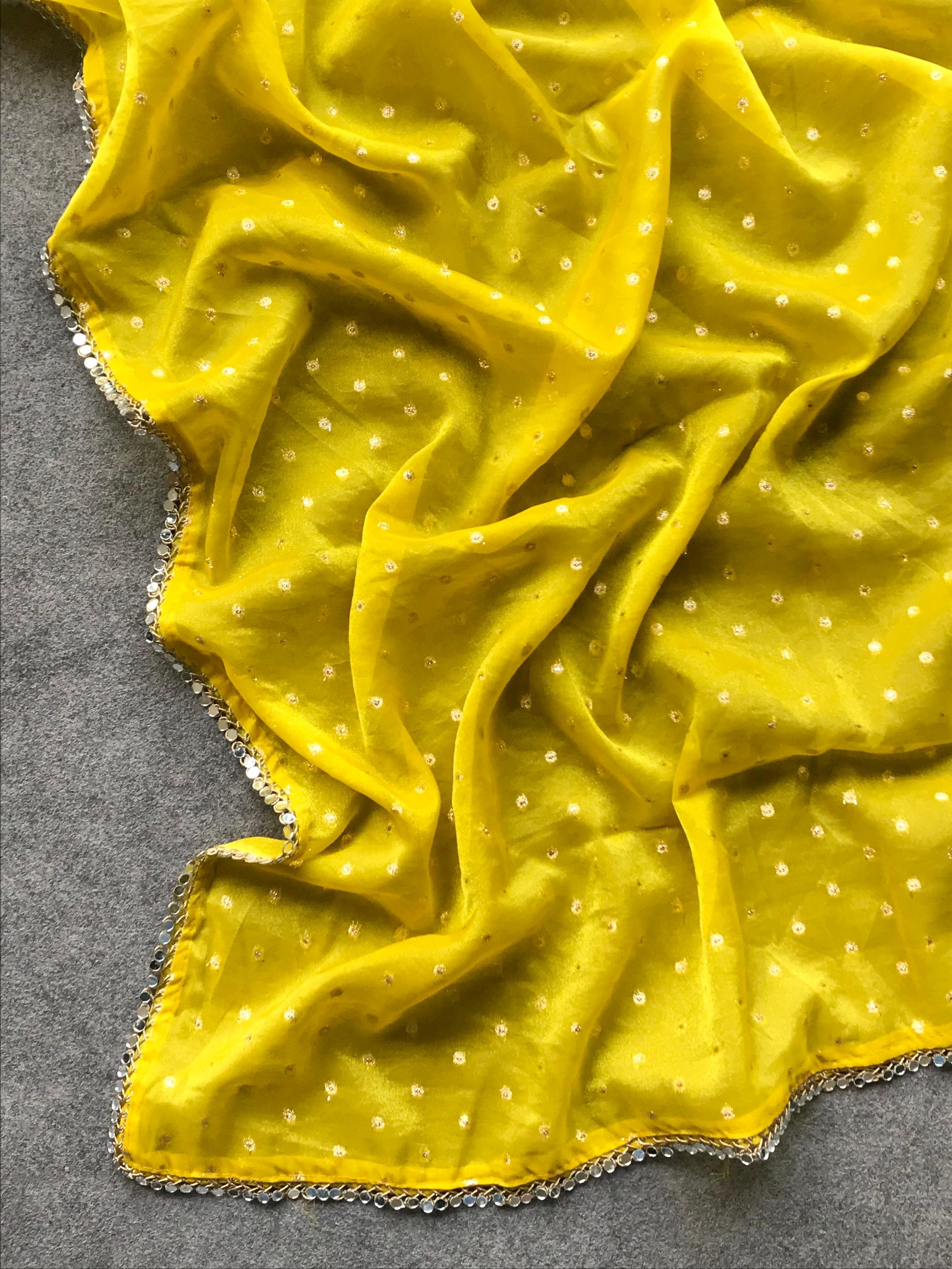 Yellow fabric with polka dots 
