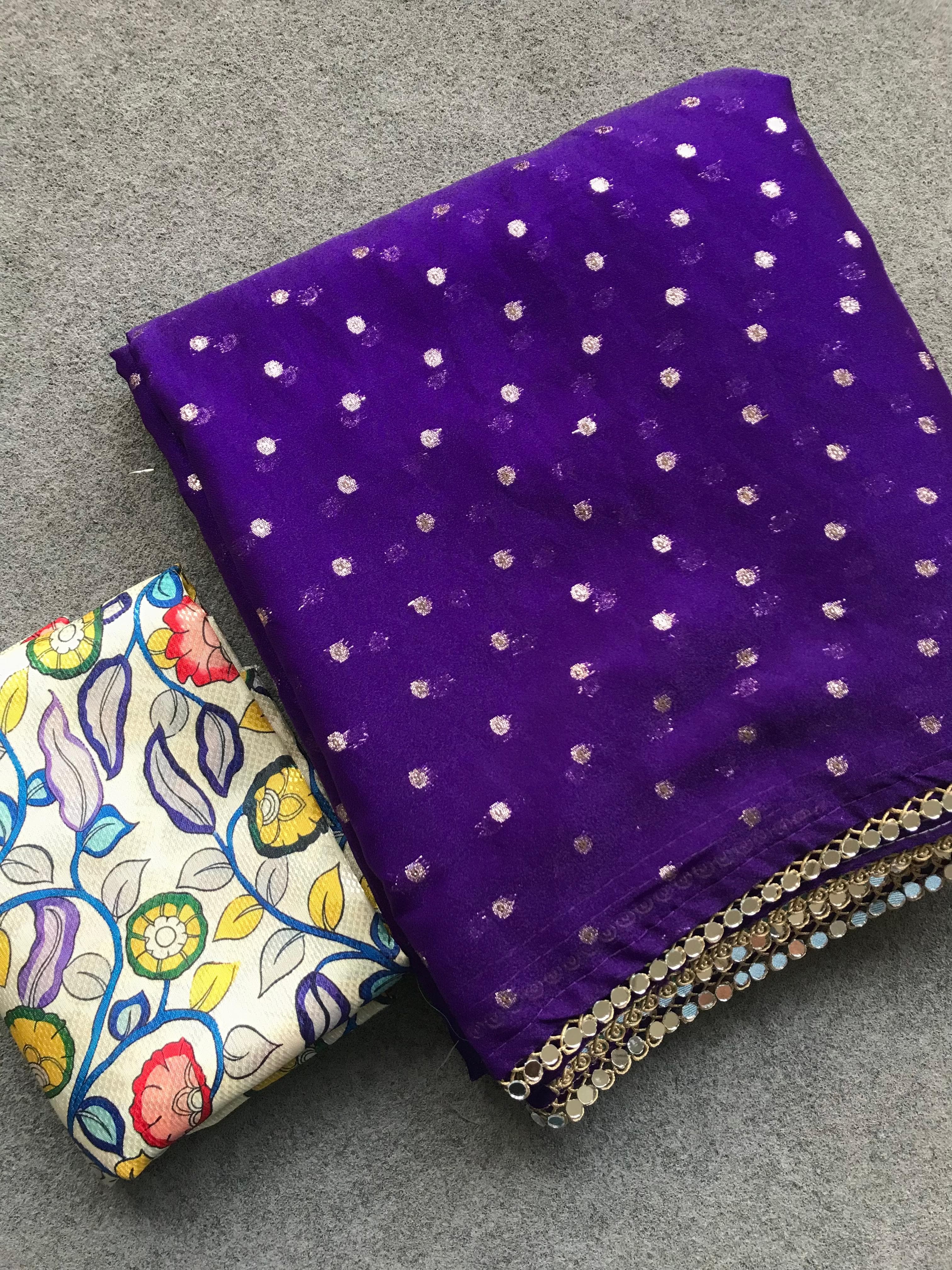 Purple fabric with polka dots and a colorful floral pattern 
