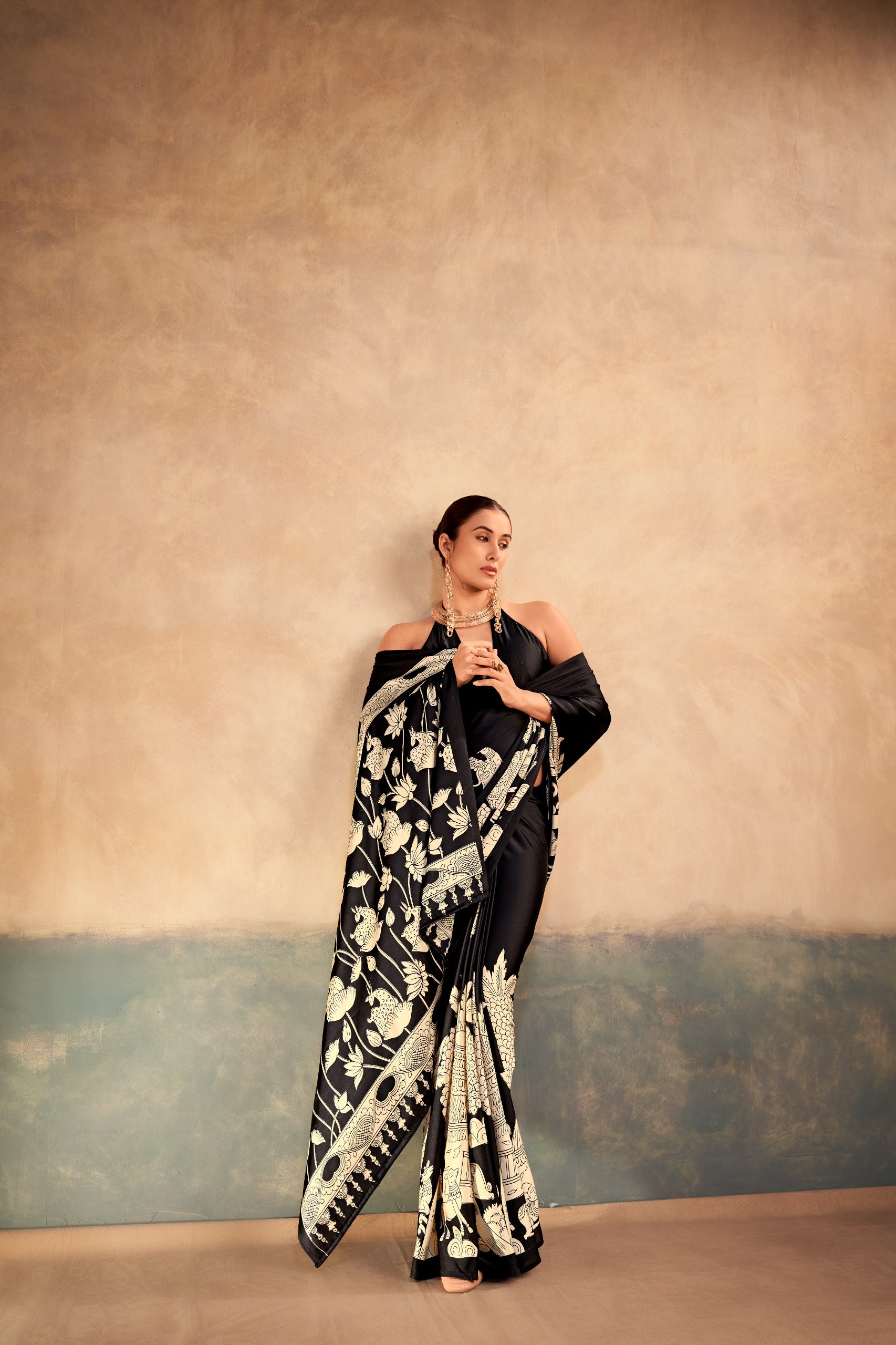 Black saree with white floral pattern 