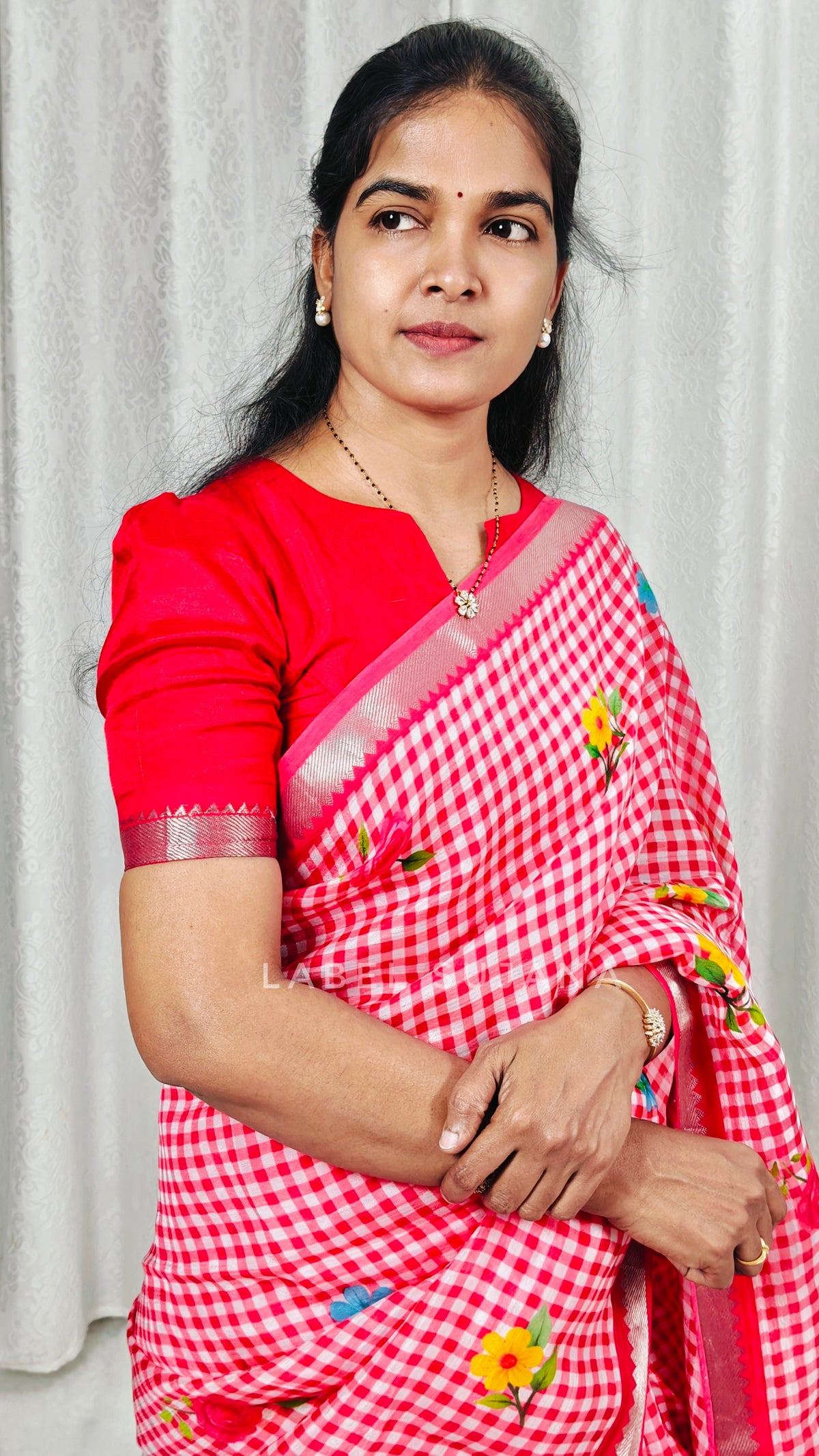 Pink colour Mangalagiri checks and floral saree