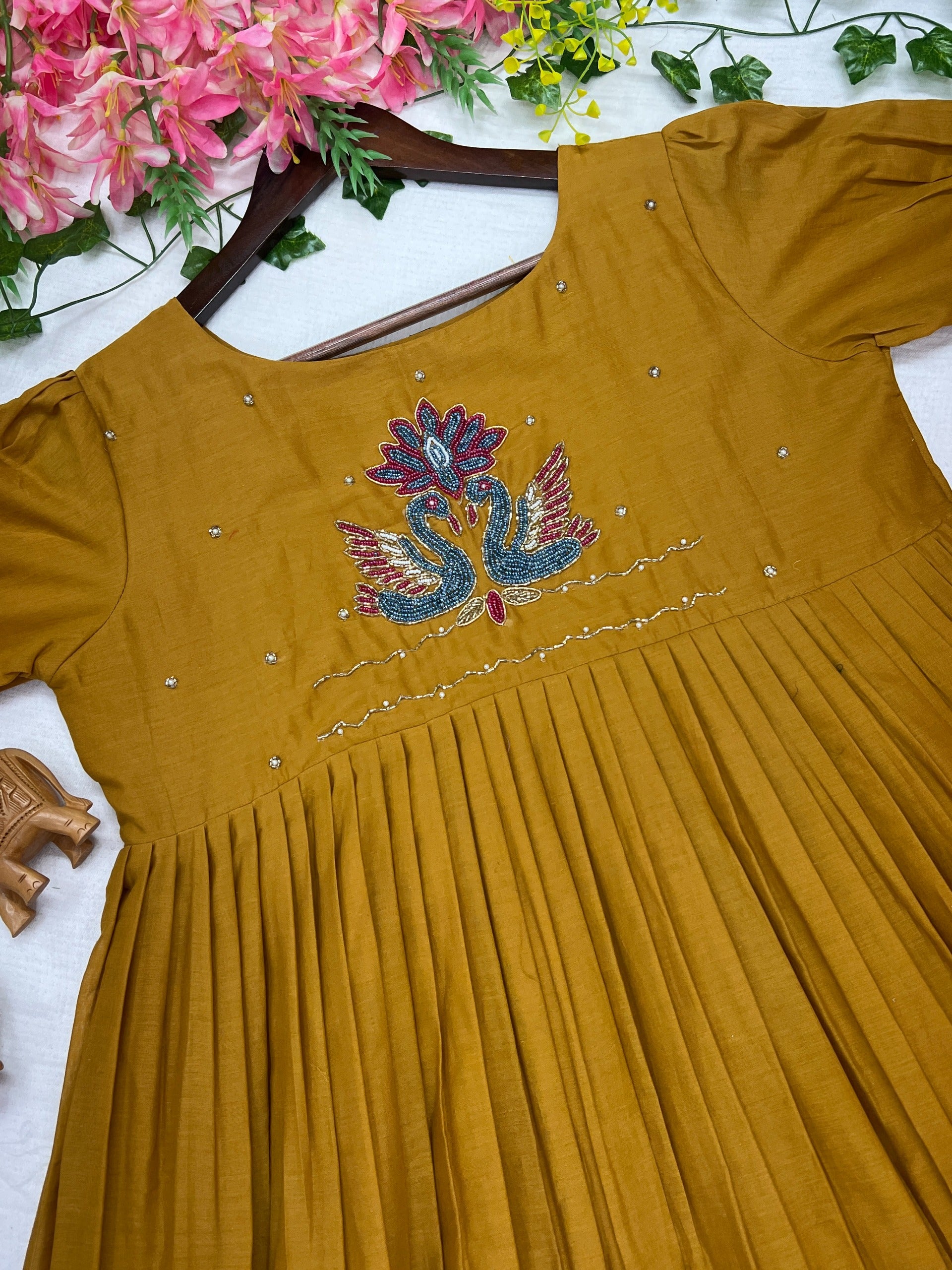 Mustard yellow dress with floral embroidery work