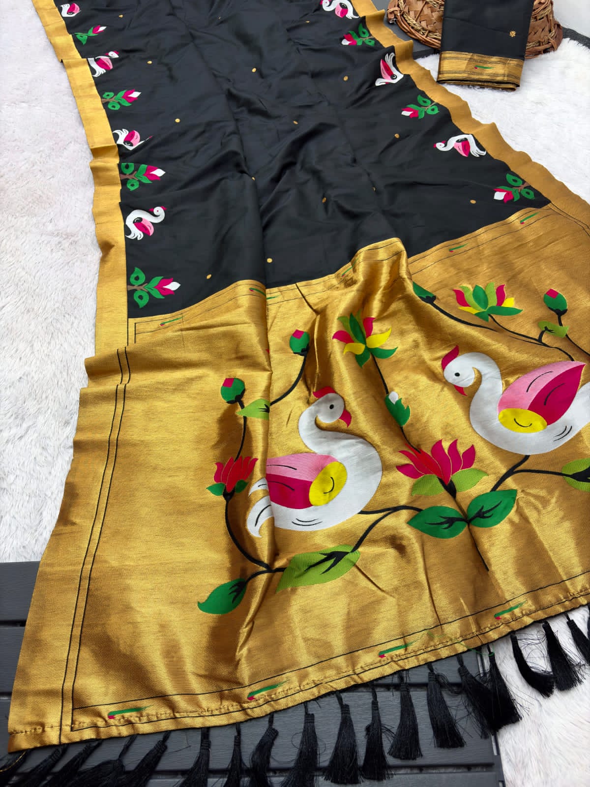 Black saree with gold border 