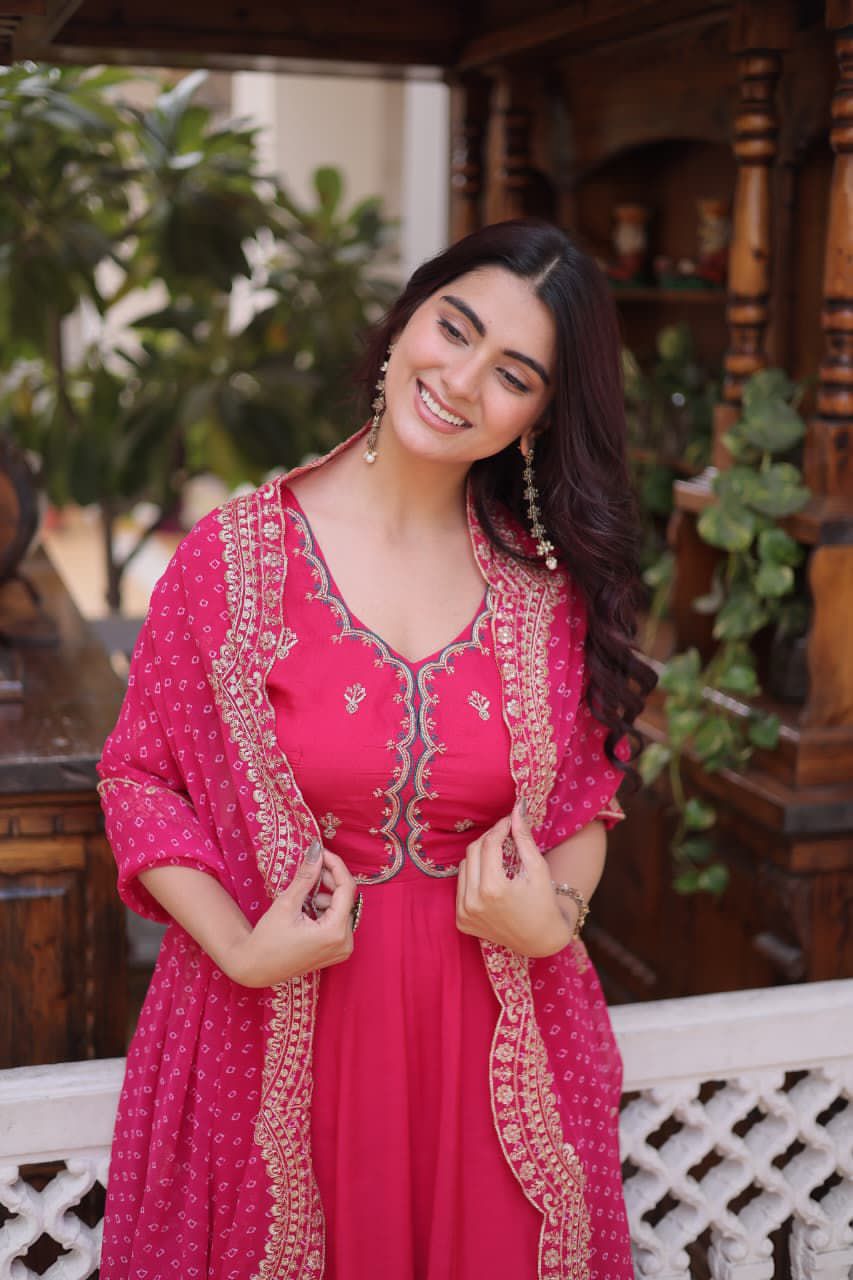 pink traditional outfit with gold details