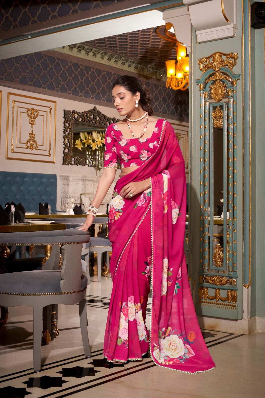 pink saree with floral patterns 