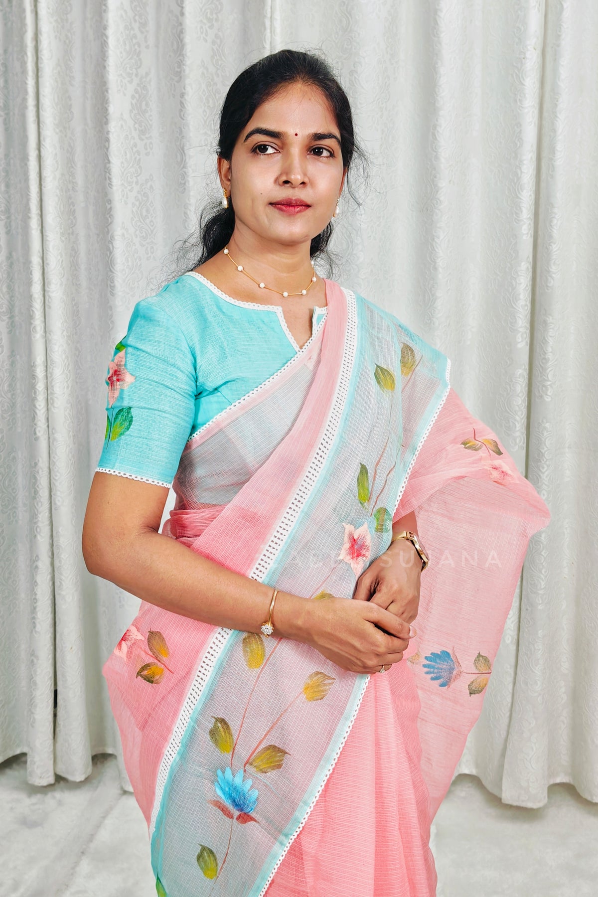 A Peach colour Brush Painted Kota Saree
