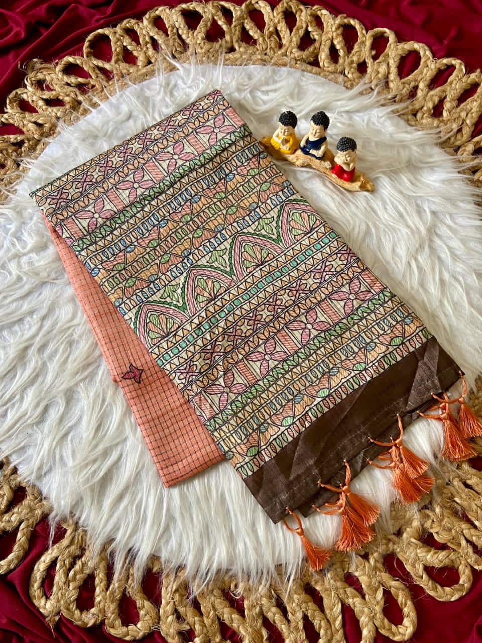 Peach saree with floral patterns 