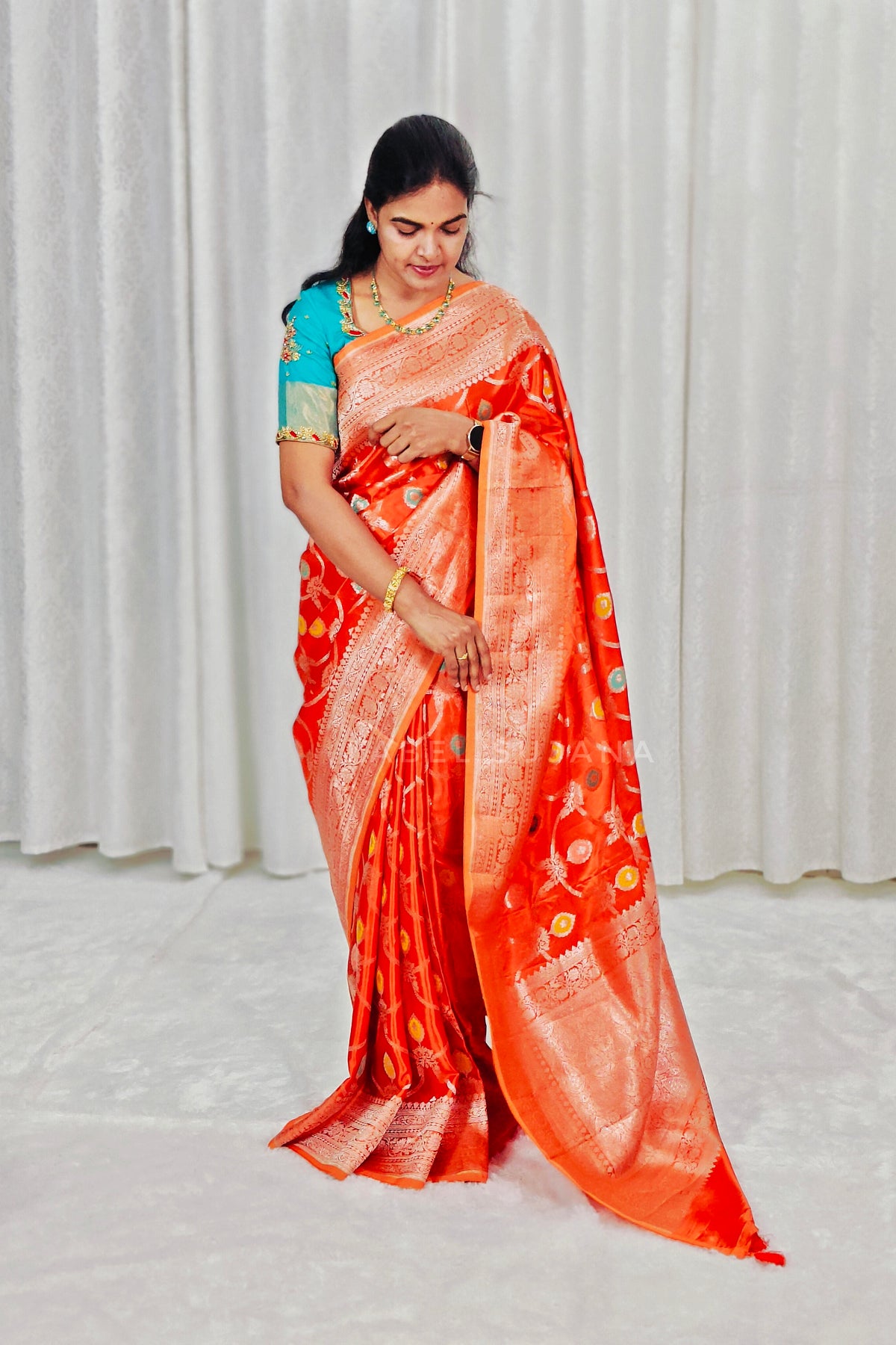 A Rust Orange Silk Saree 