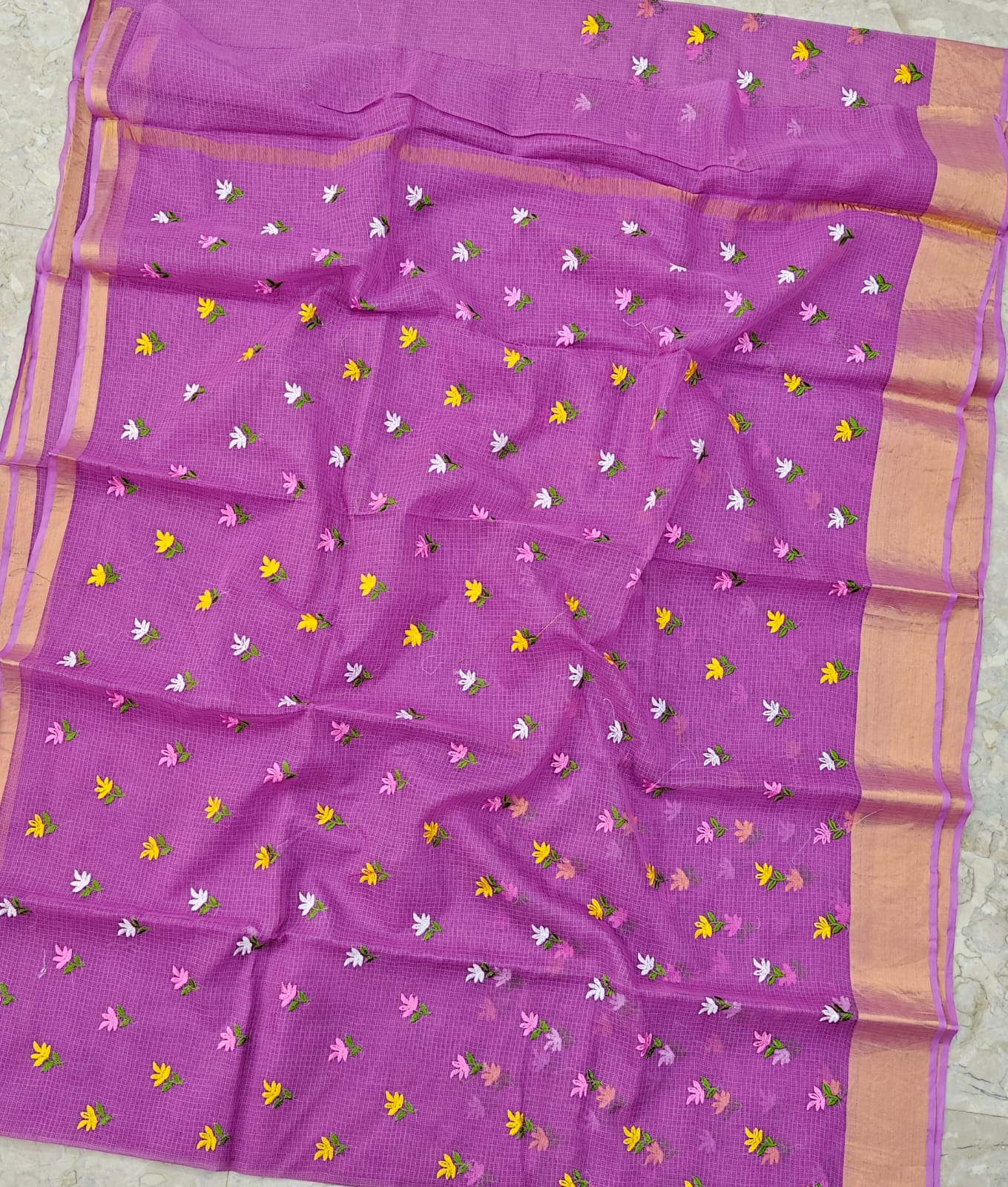 Lavender saree with floral patterns 