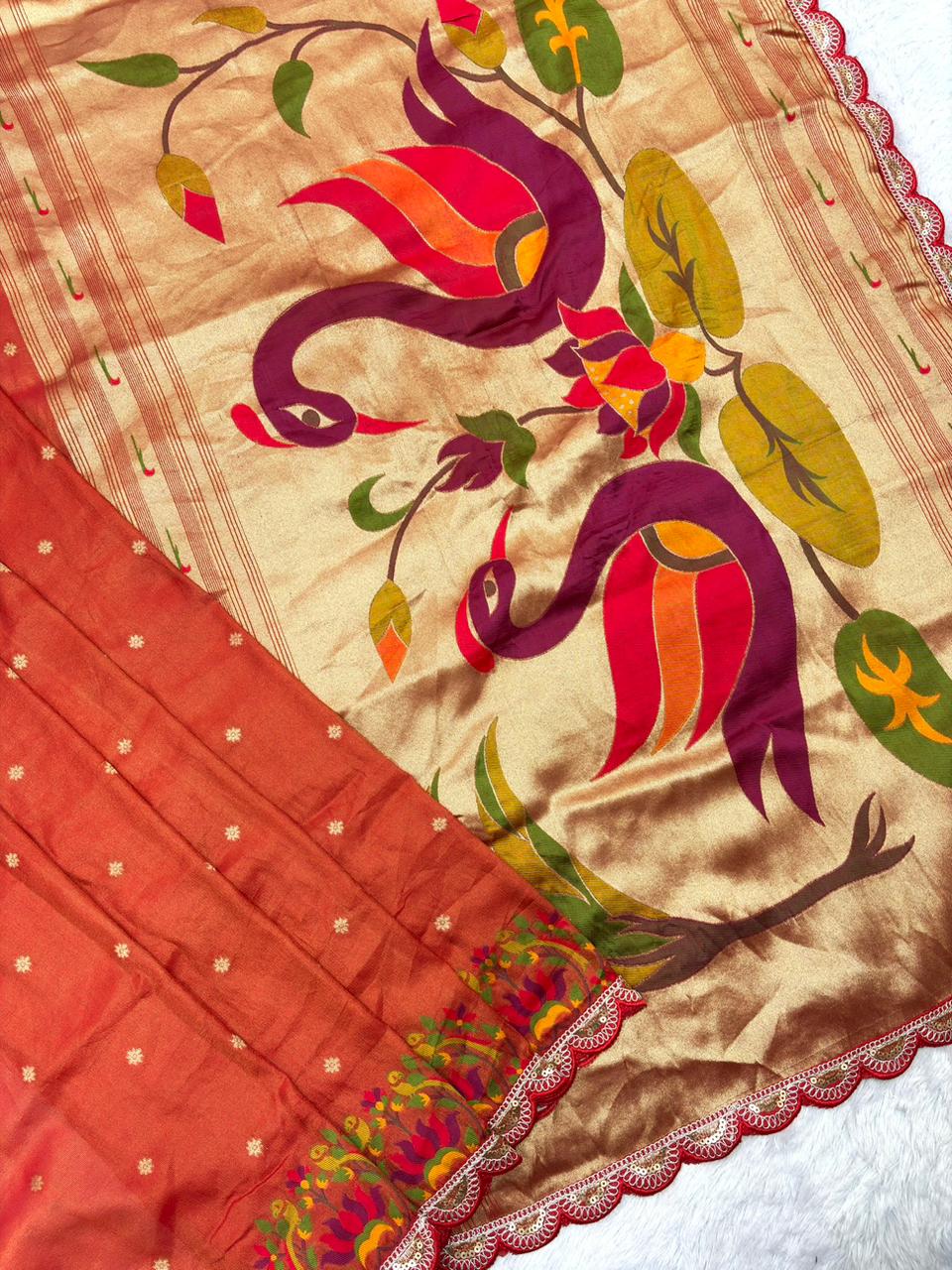 Rust saree with floral patterns 