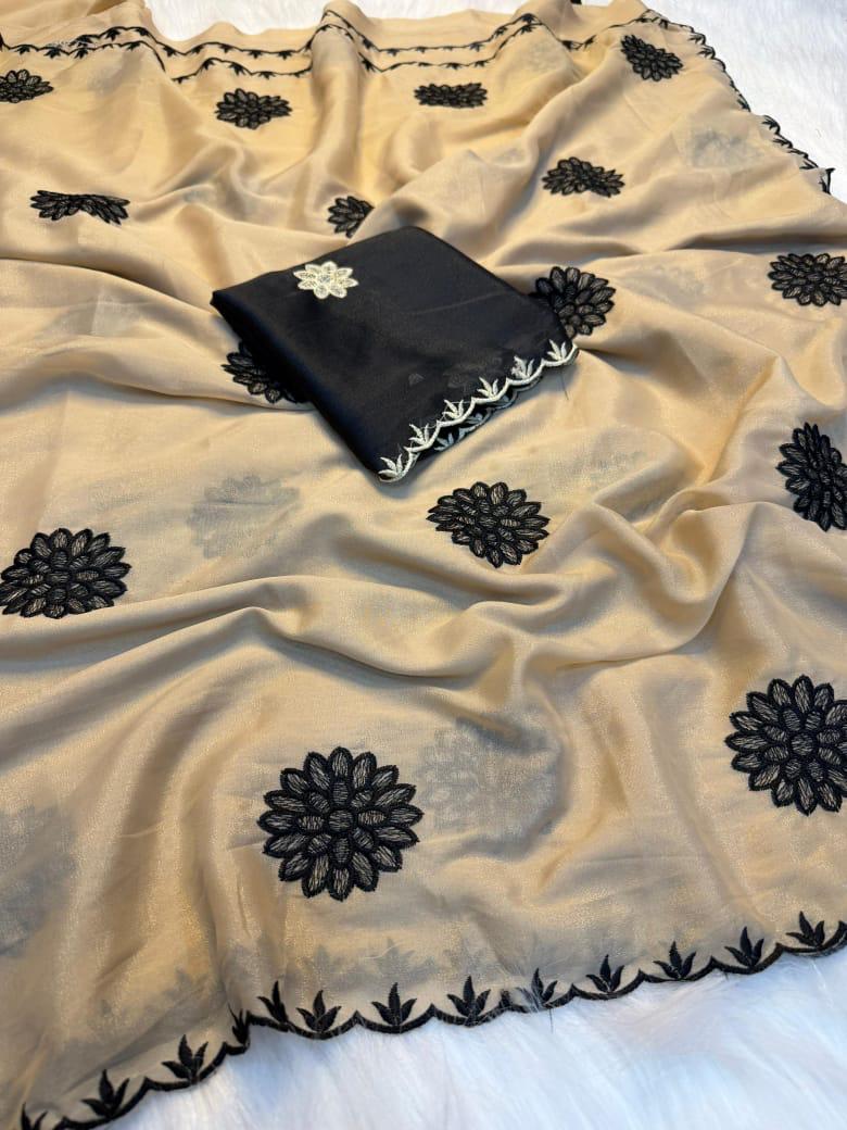 Beige fabric with black floral patterns on a white background