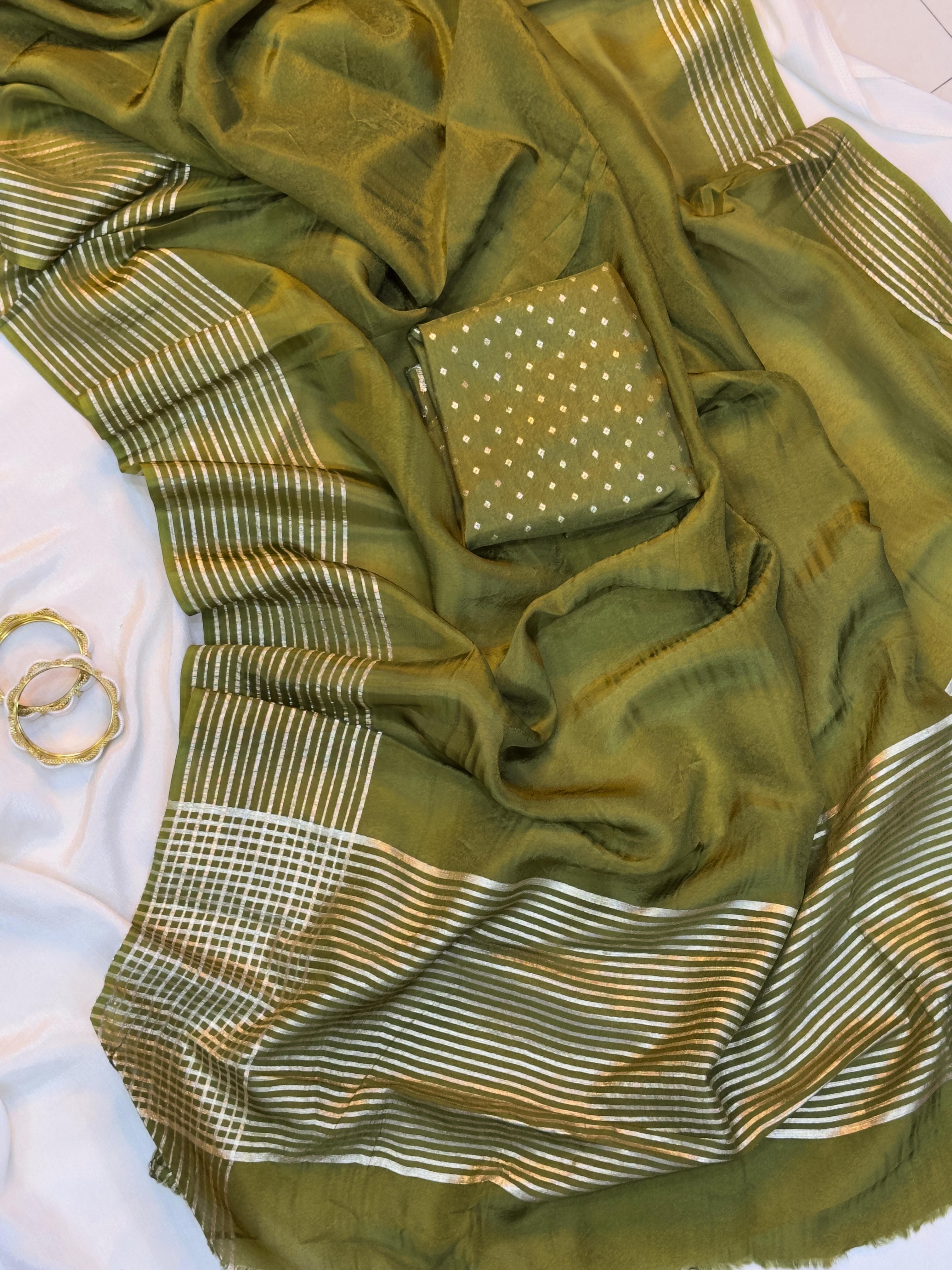 Olive Green fabric with gold patterns on a white background