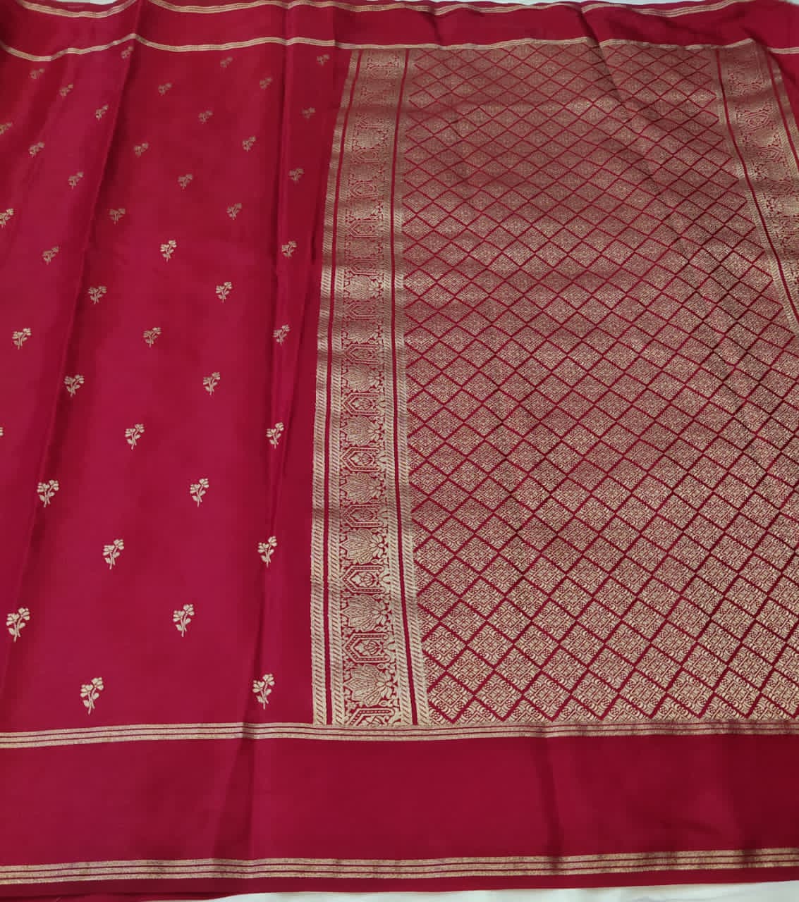 Maroon saree with floral patterns 