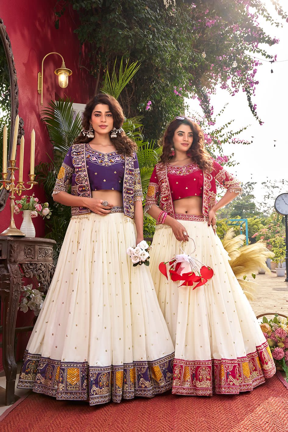 Traditional outfits with white skirts and purple, pink tops 