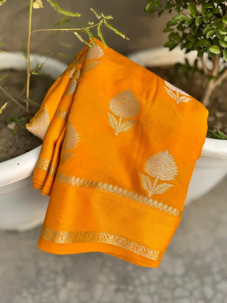 Yellow saree with floral patterns 