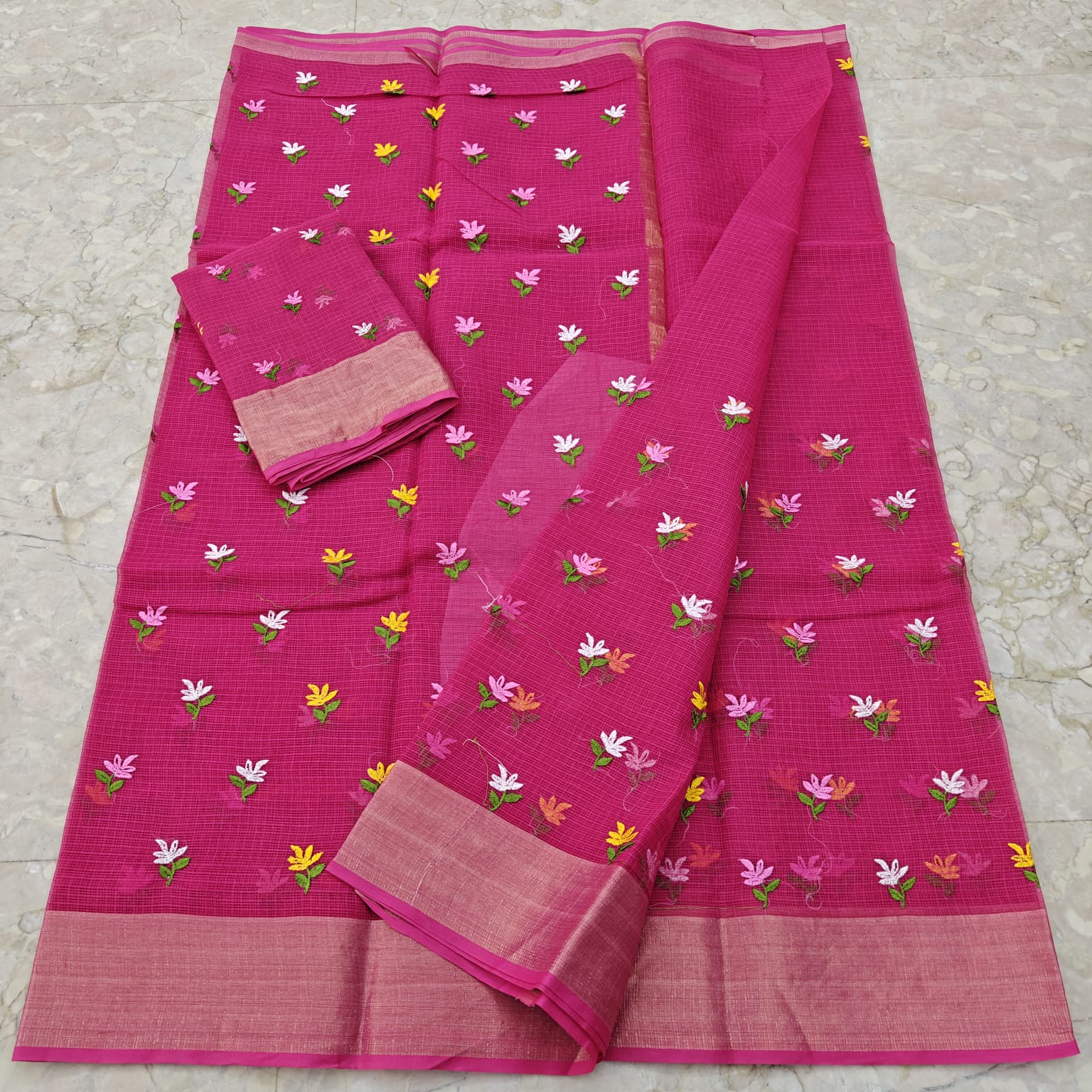 Pink saree with floral patterns 