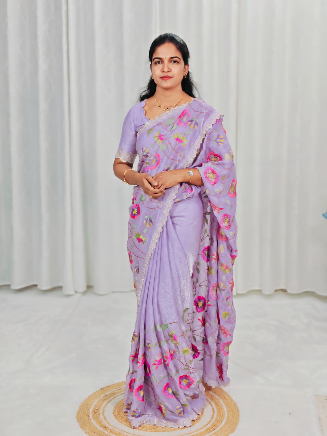 A Lavender embroidery saree with matching blouse