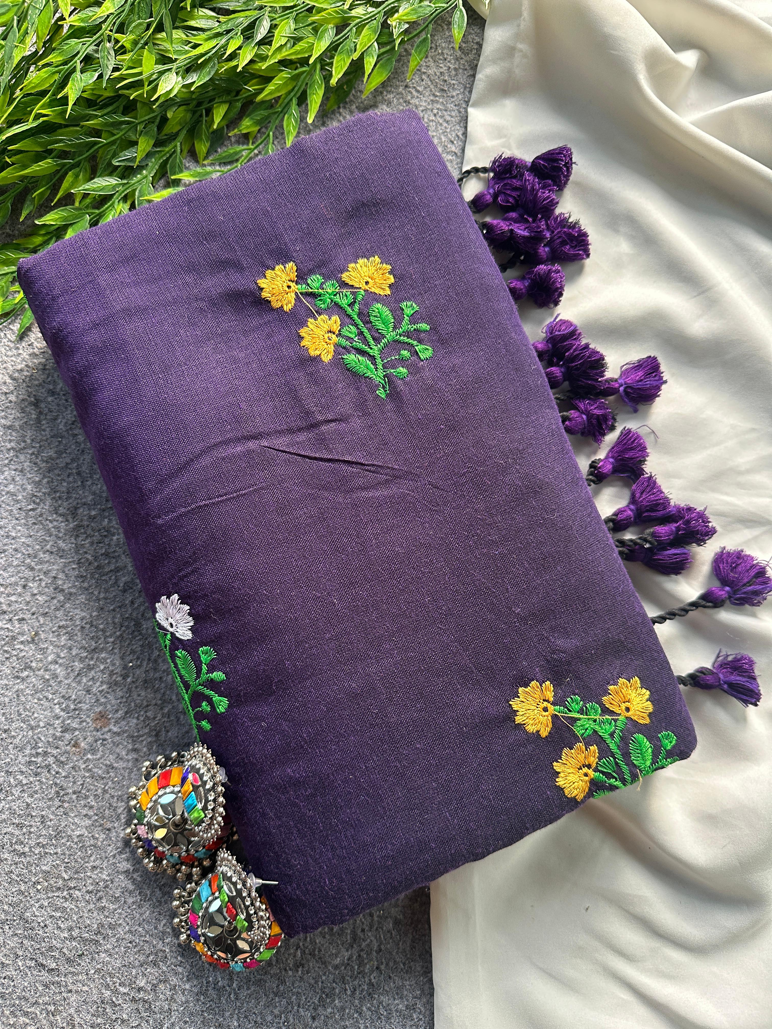 Lavender fabric with floral embroidery patterns 