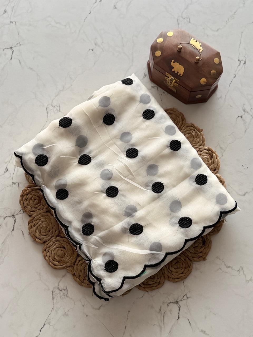 White with black dots