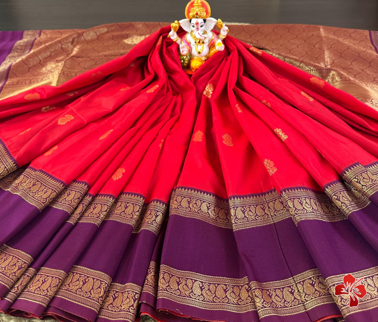 Red saree with gold border