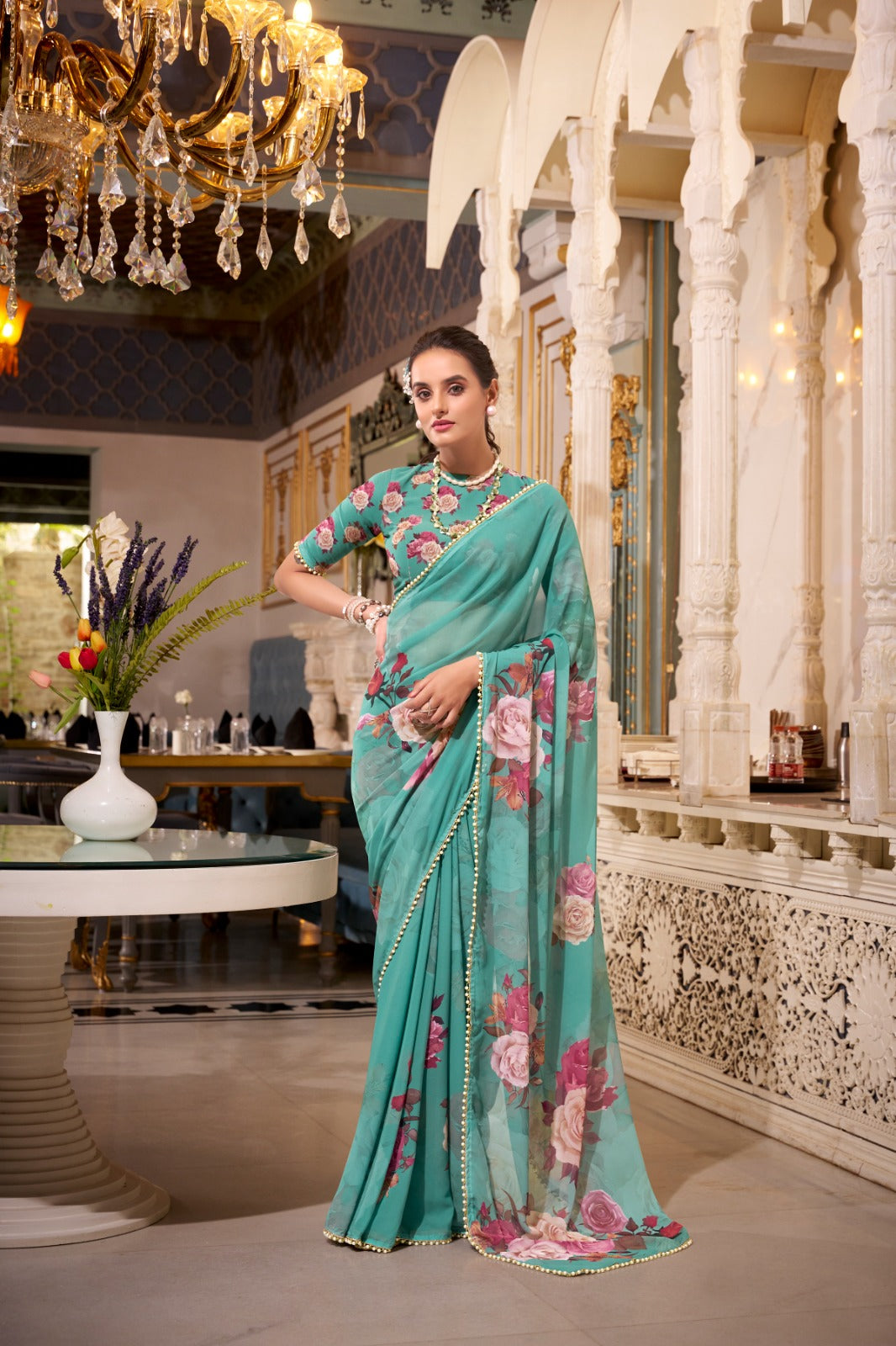 Rama Green saree with floral patterns 