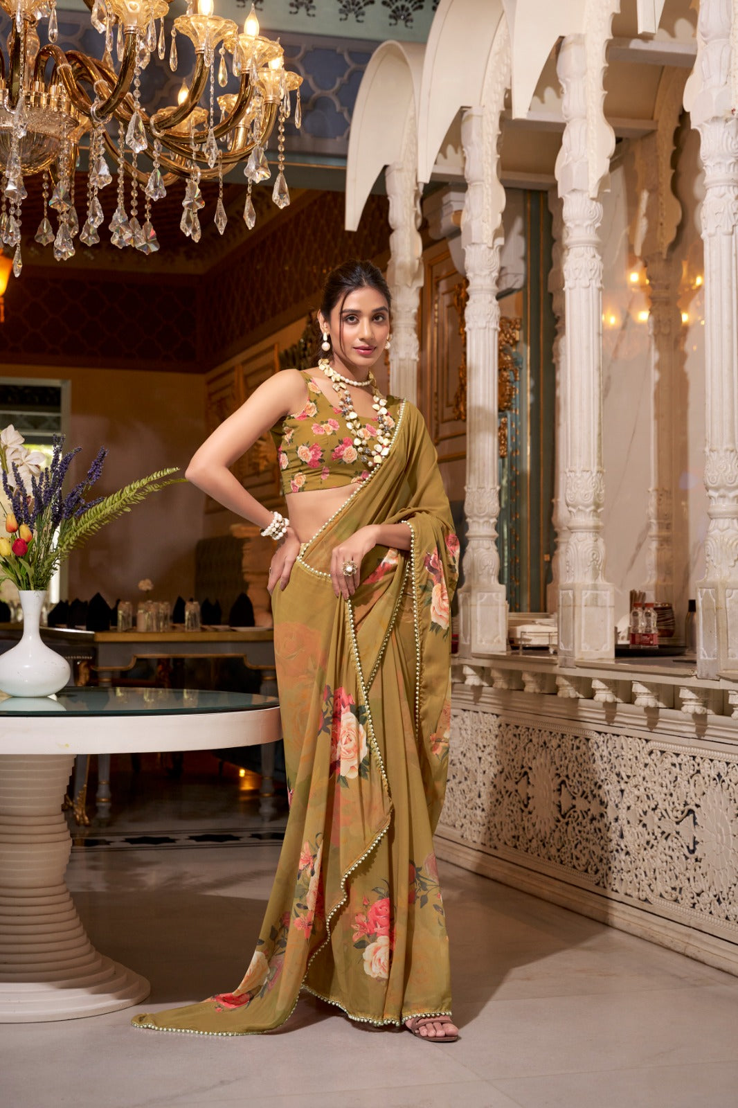 Olive Green saree with floral patterns 