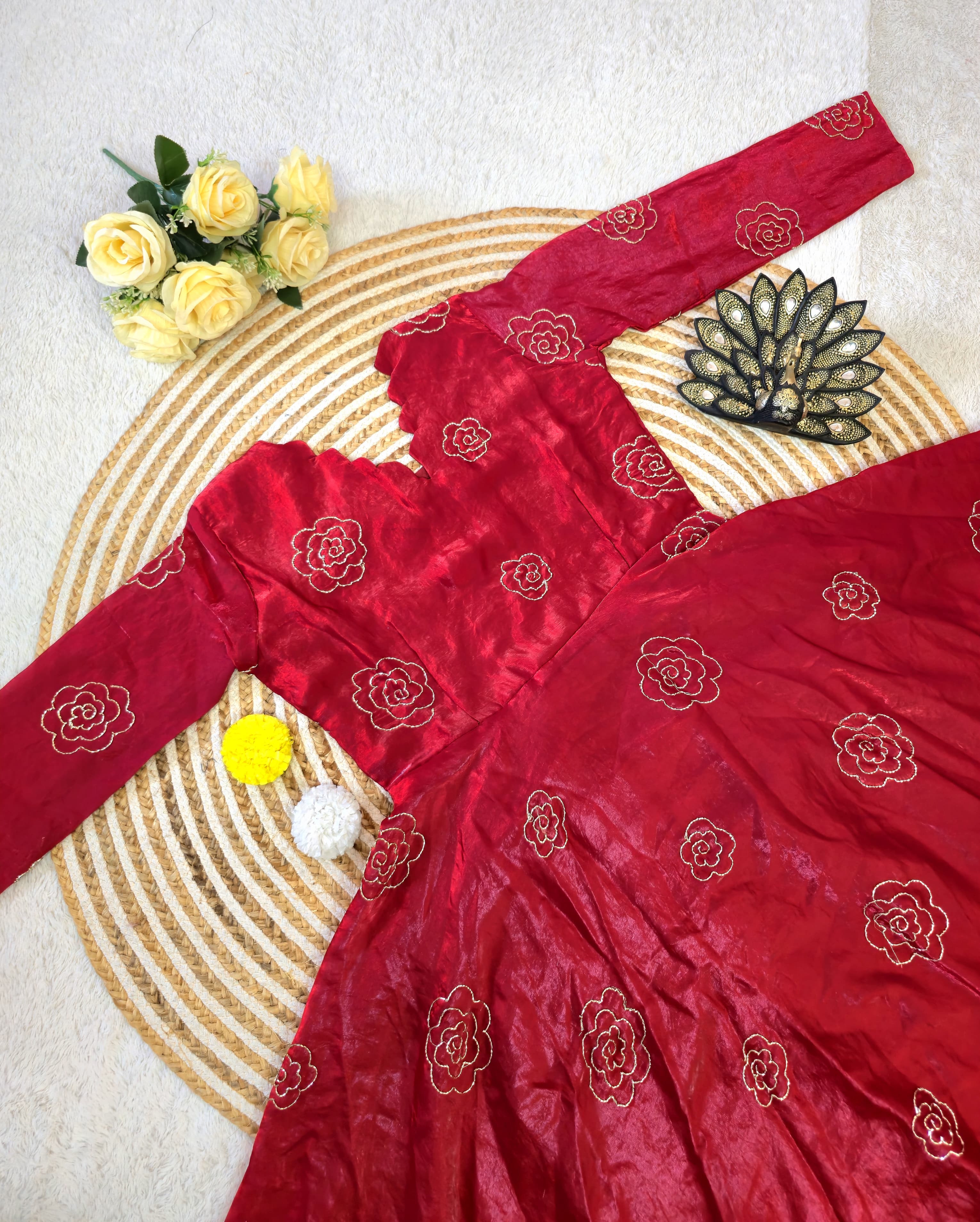 Red embroidered dress with floral patterns 