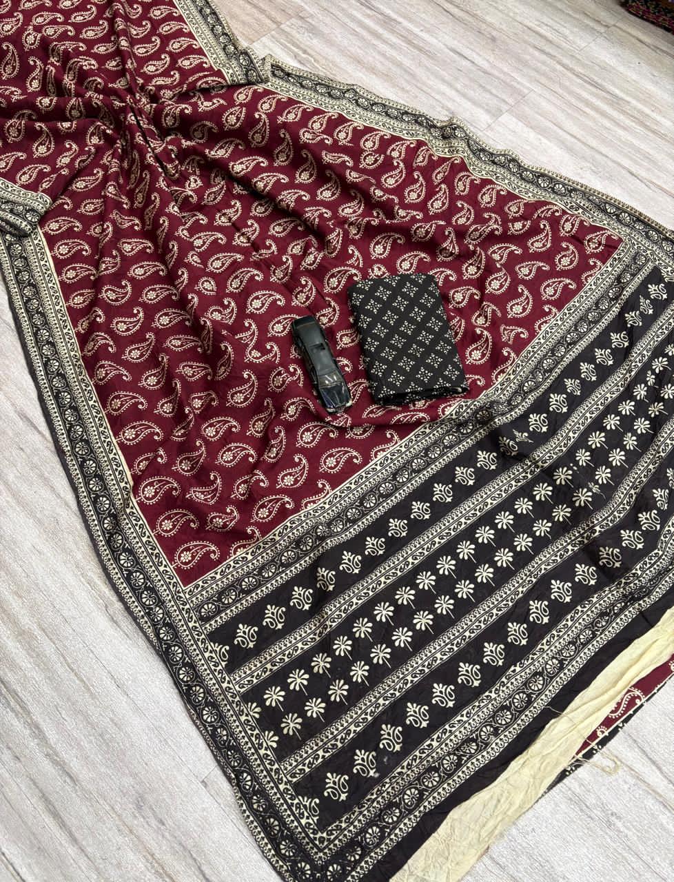 Maroon Patterned fabric with a pocket on a wooden surface