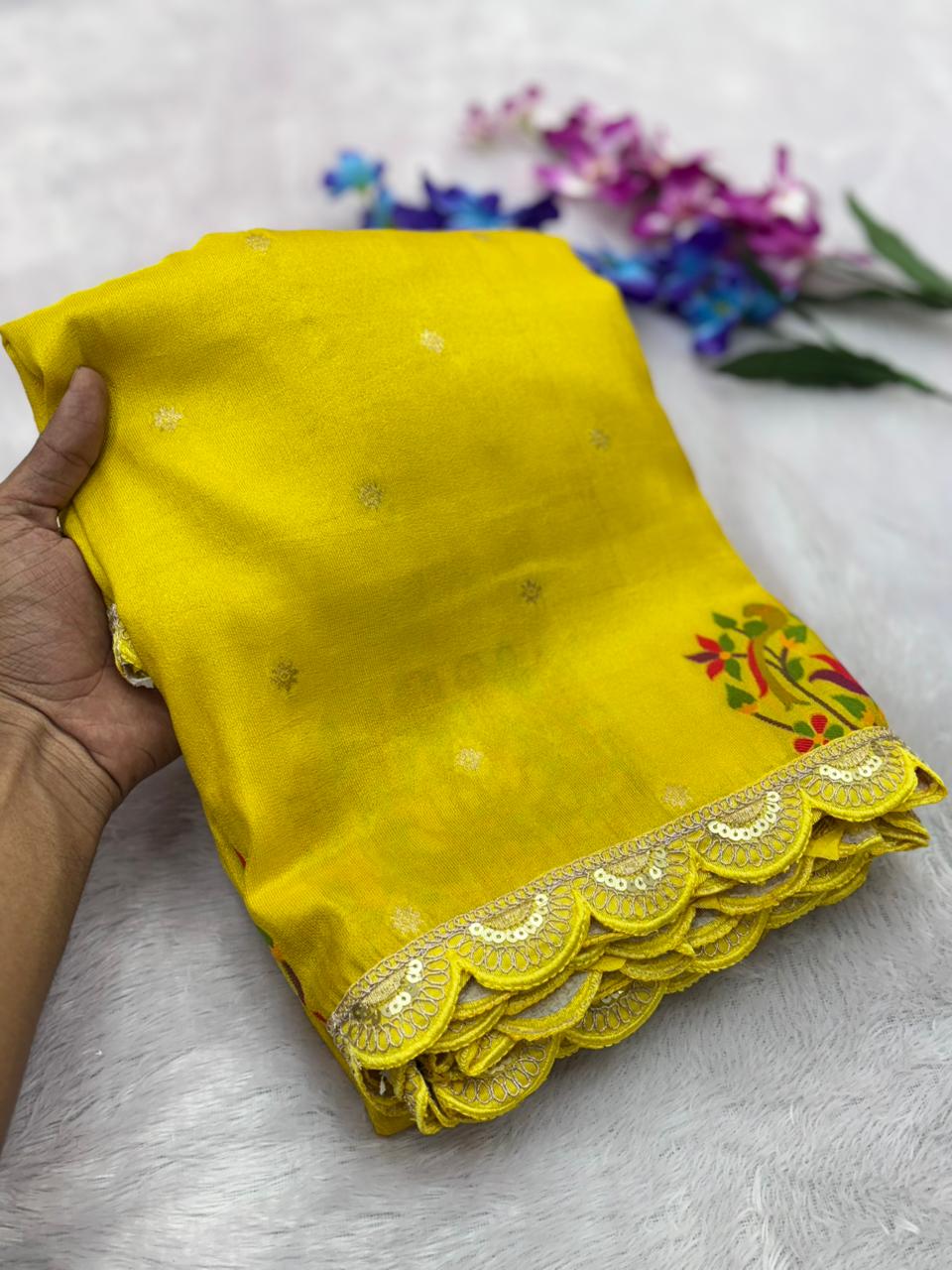 Yellow saree with floral patterns 