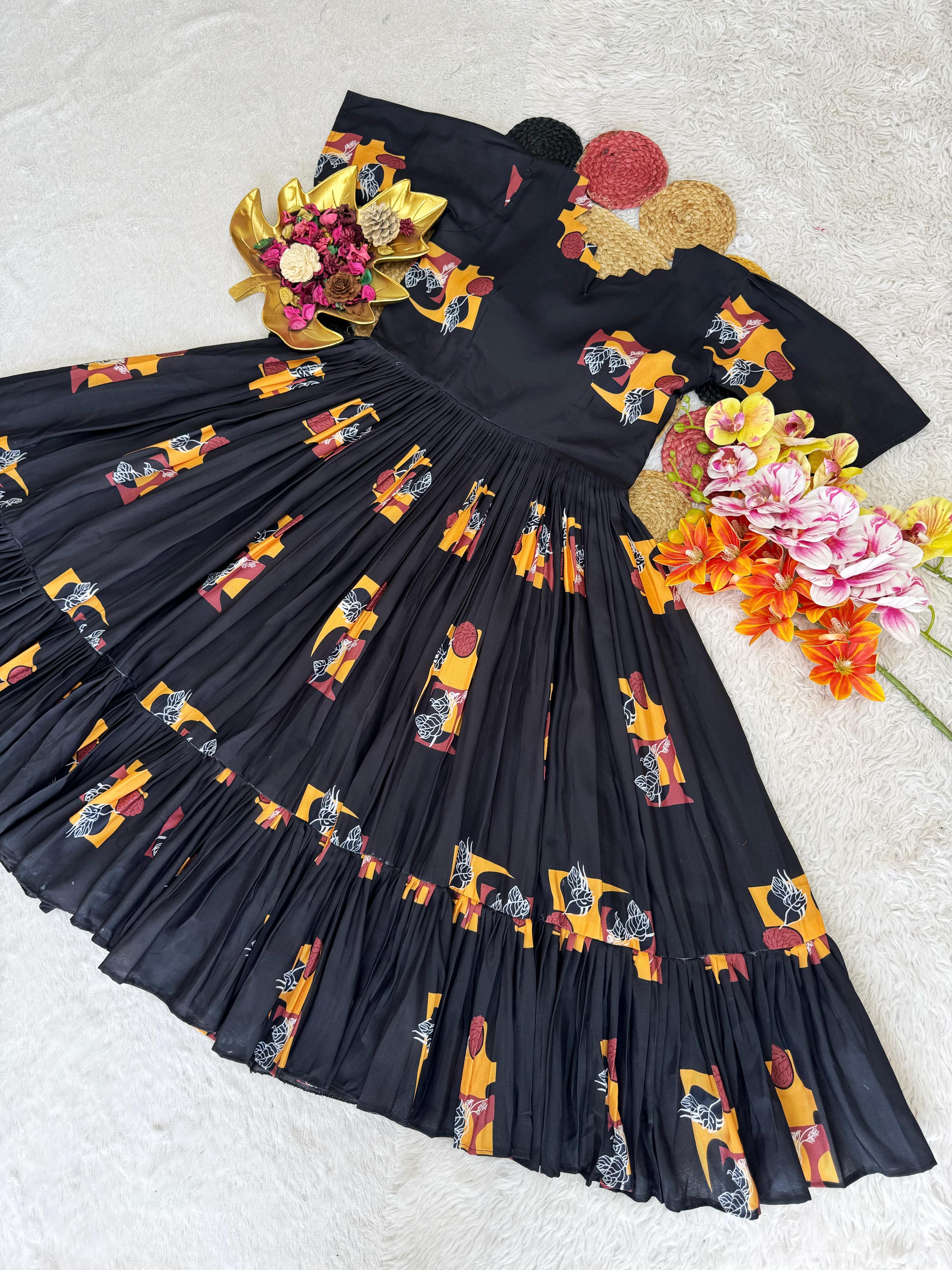 Black dress with colorful floral and car pattern on a texture surface