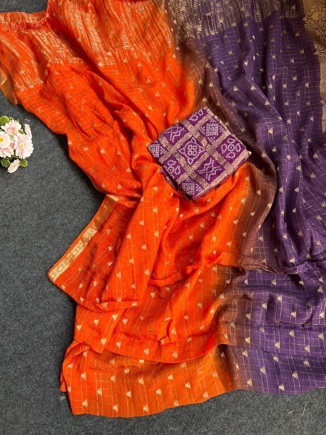 Purple saree with a decorative box on a surface