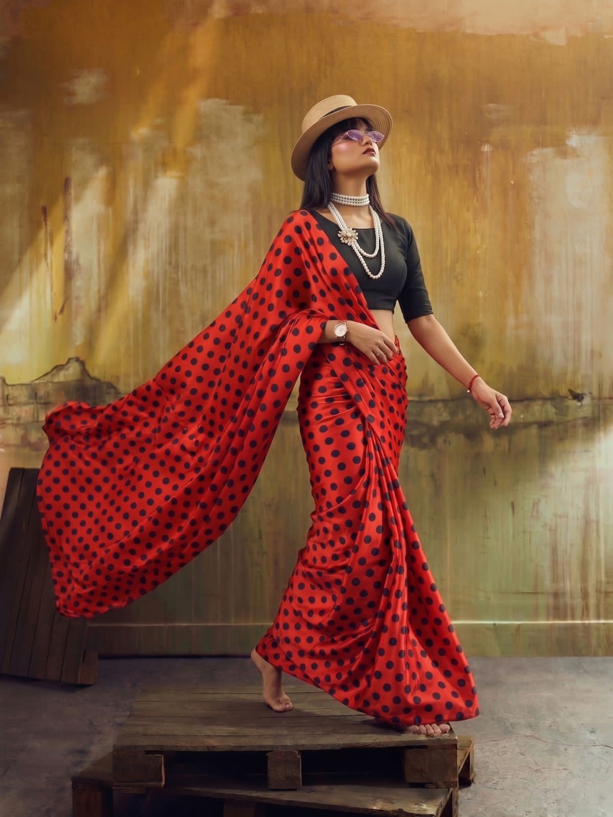 red polka dot saree