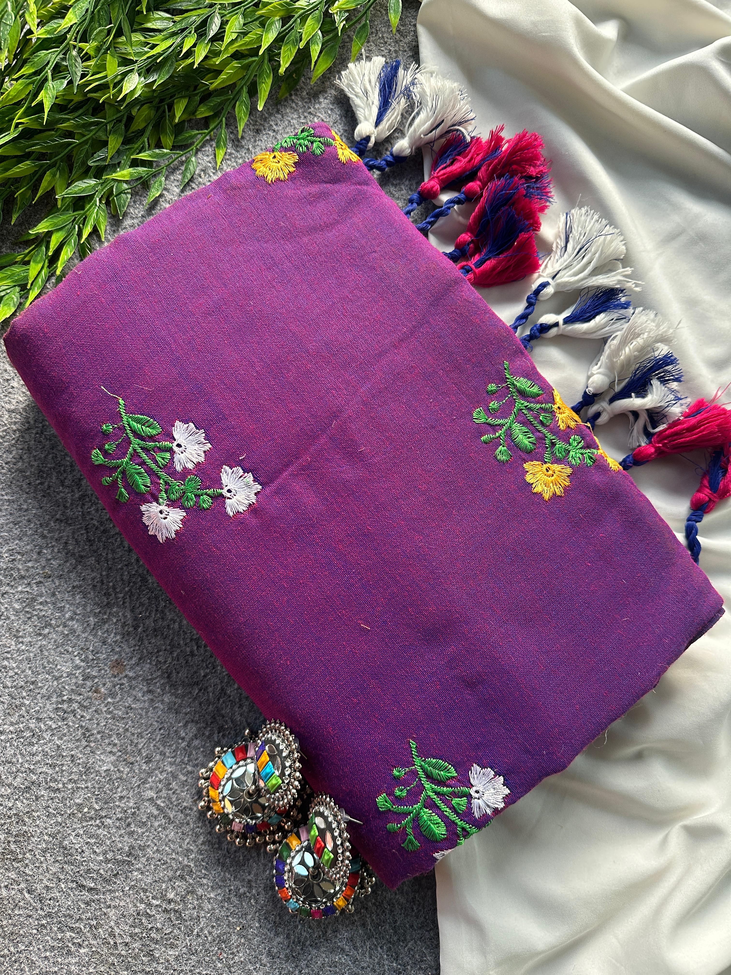 Purple fabric with floral embroidery work 