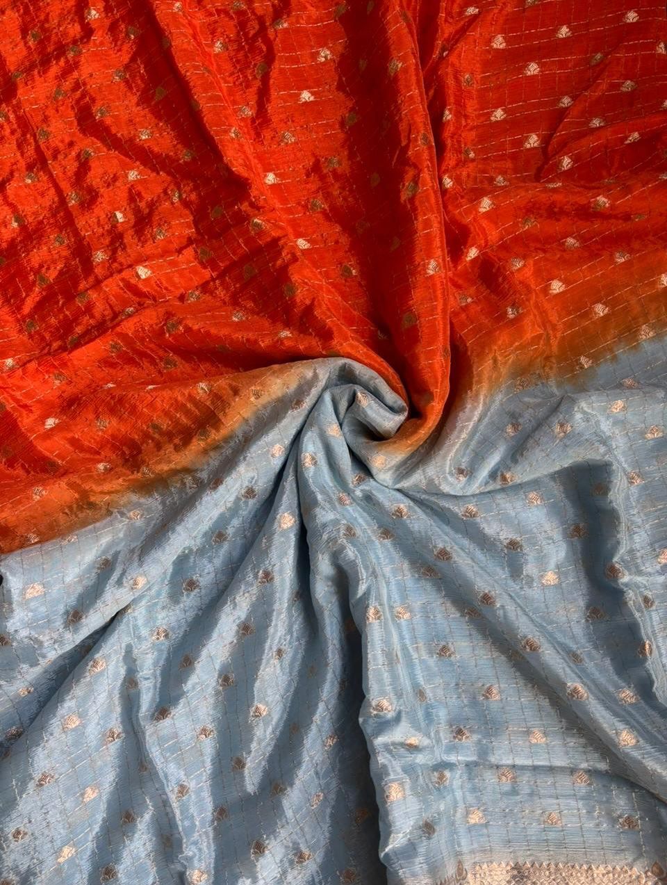 Cyan fabric with intricate patterns