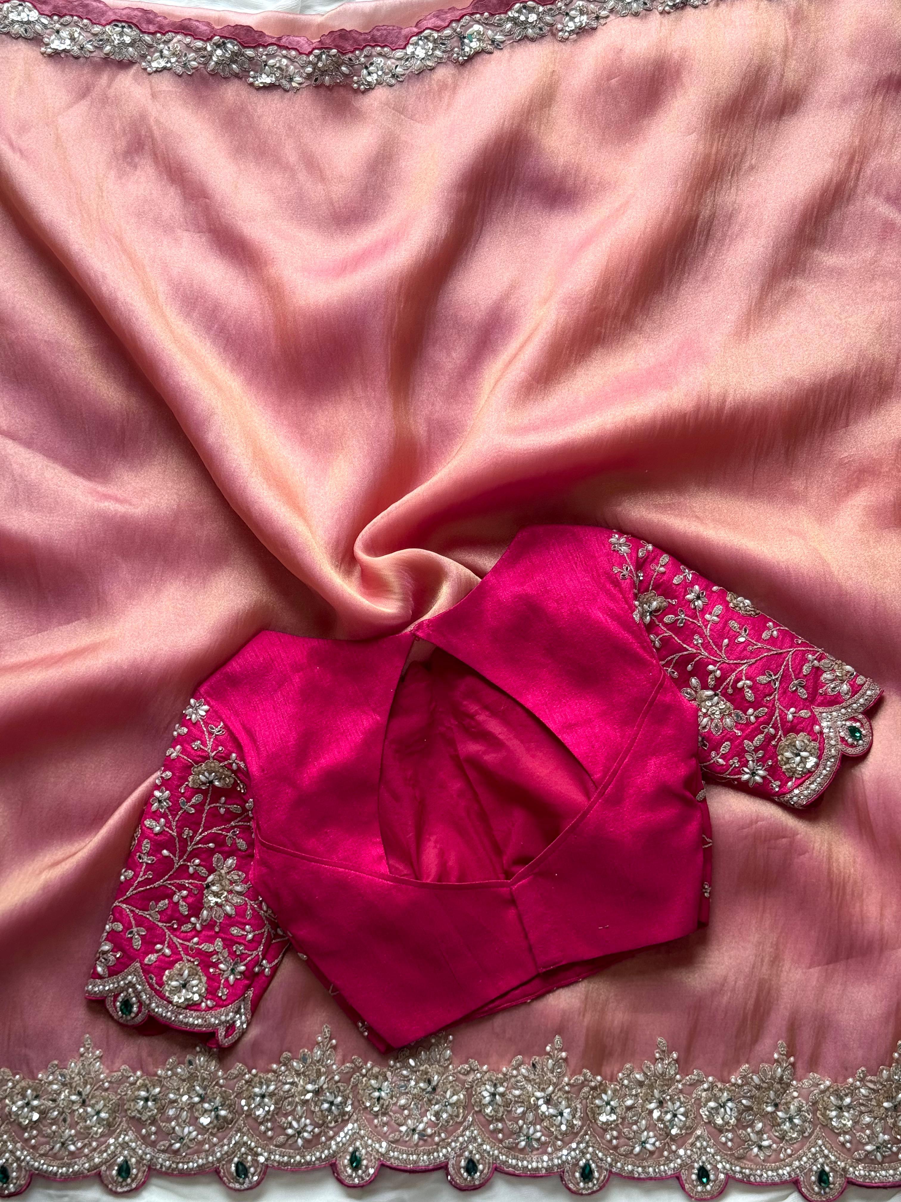 Onion Pink fabric with silver embroidery and a pink blouse with silver detailing.